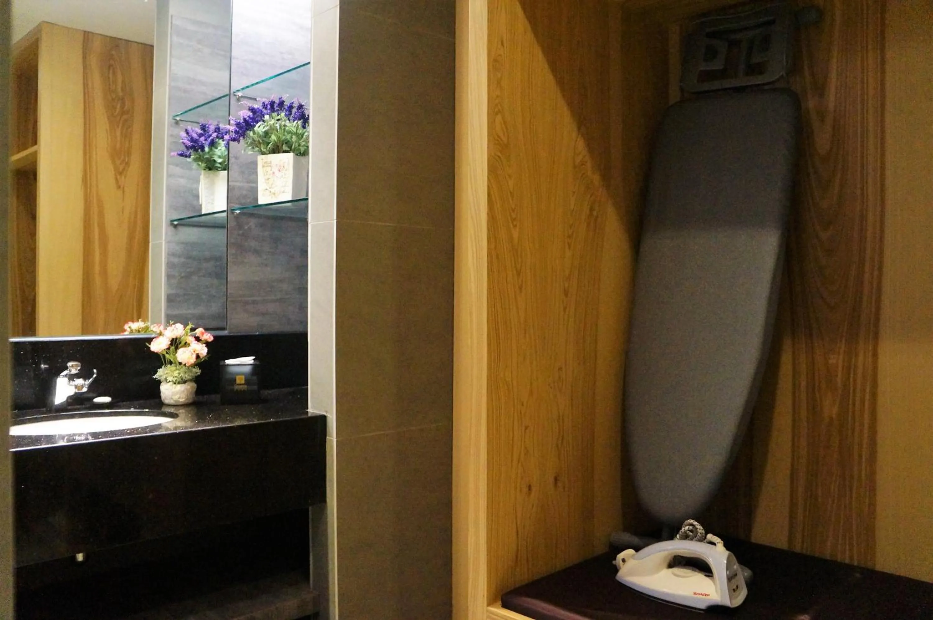 Bed in Greens Hotel & Suites