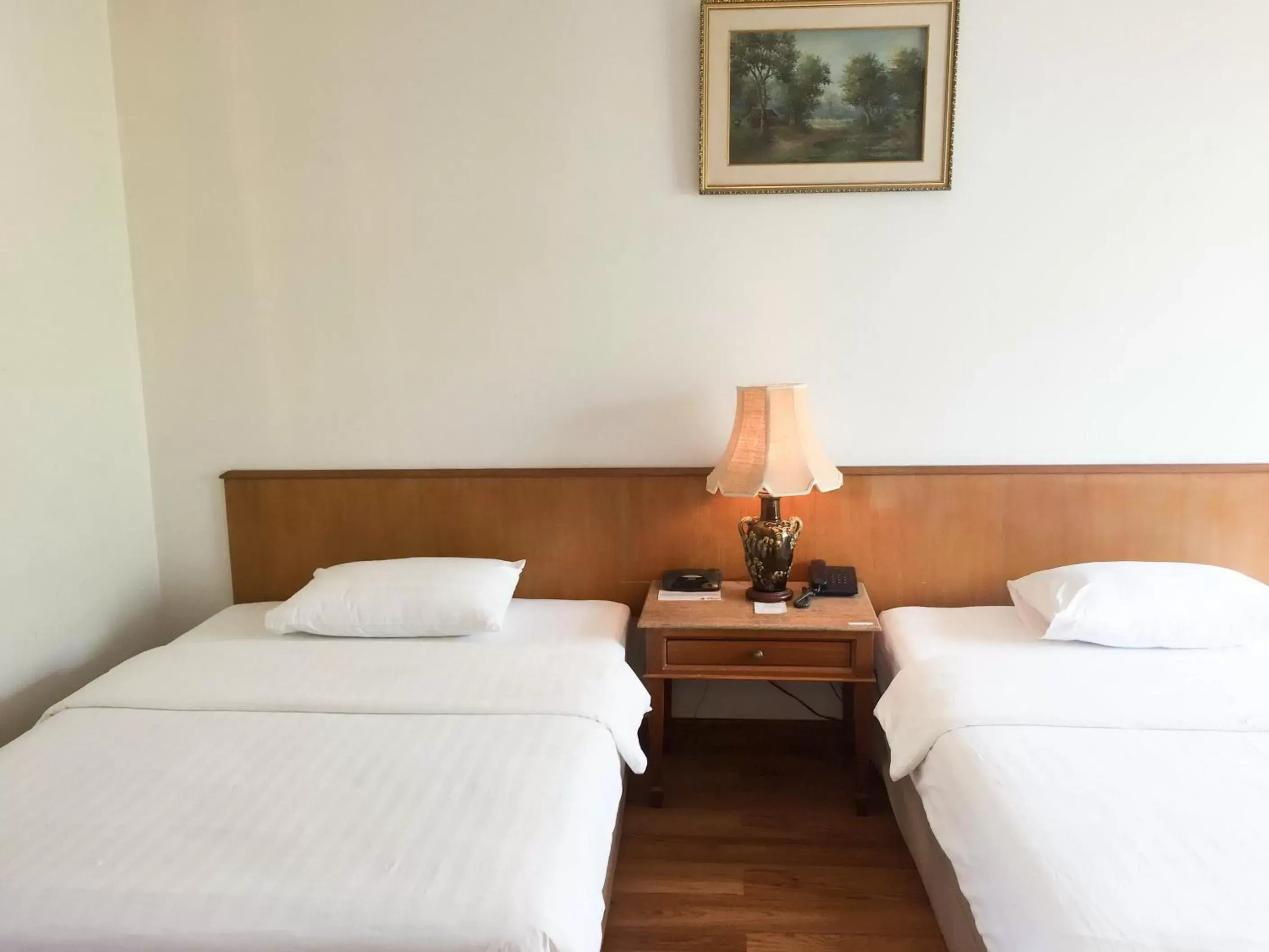 Bed in Sirin Hotel Hua Hin