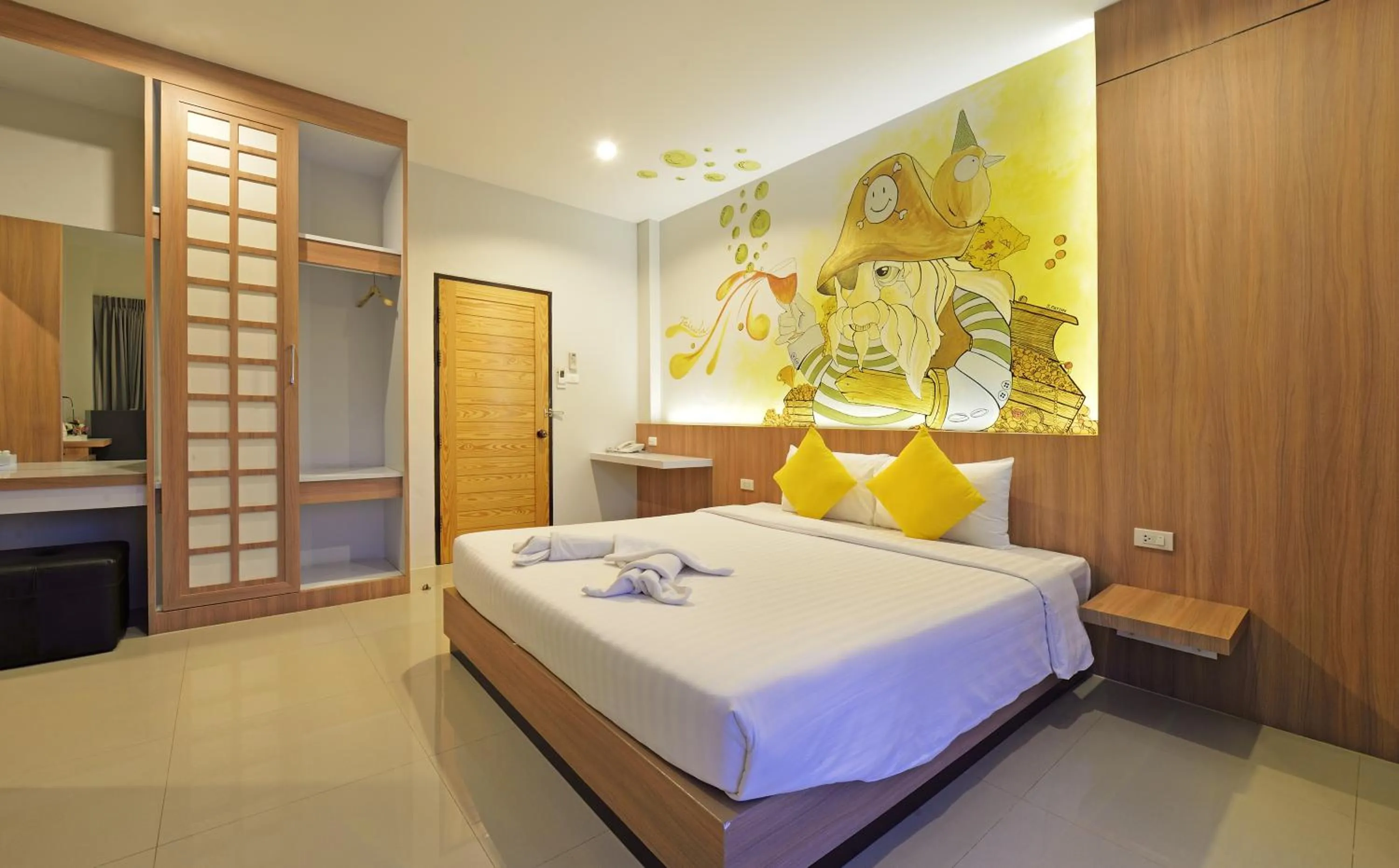 Bed in Tairada Boutique Hotel