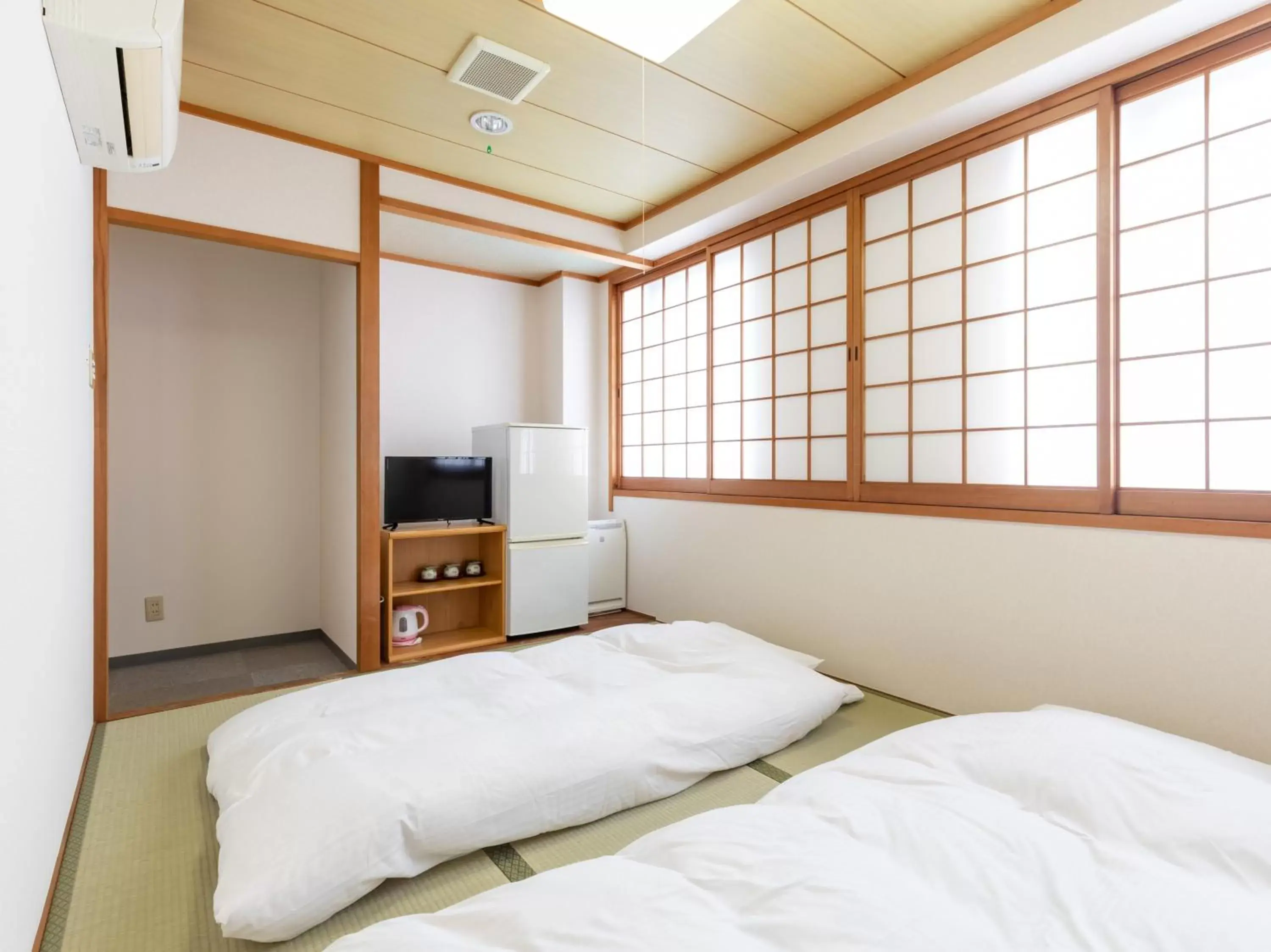 Photo of the whole room, Bed in Tabist Hotel Yuan Akashi