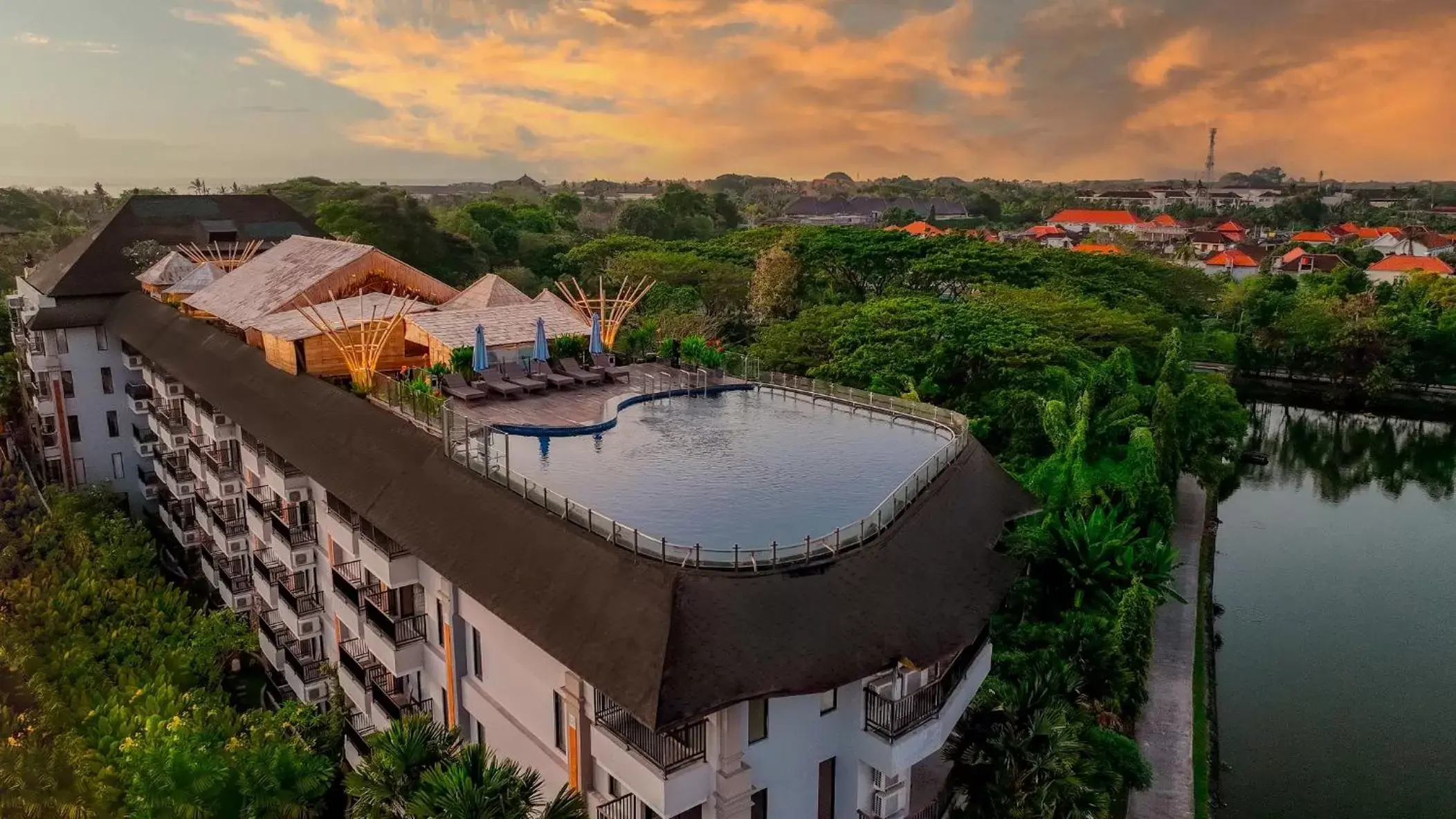 Swimming pool, Bird's-eye View in The Nest Hotel Nusa Dua