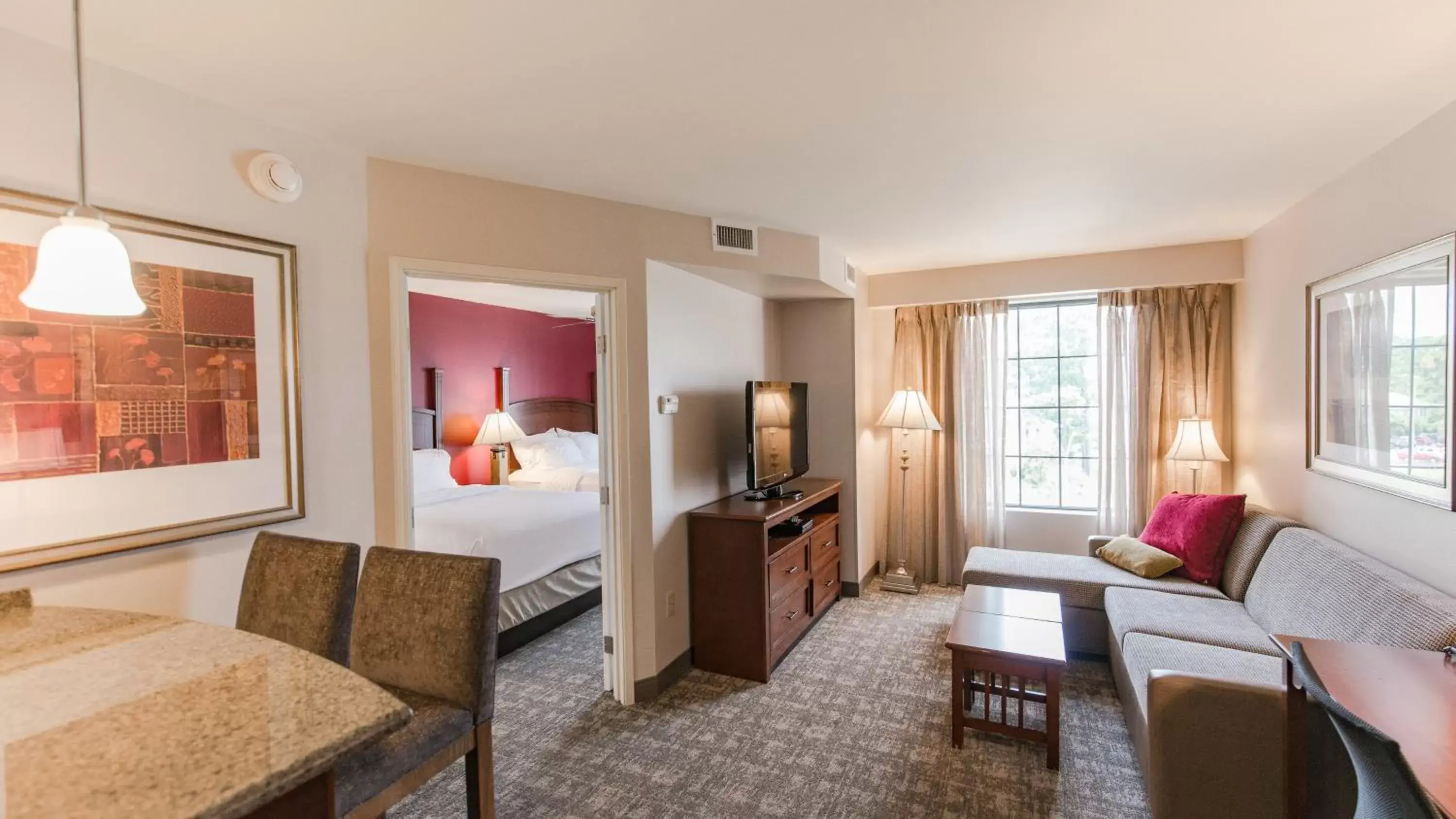 Photo of the whole room, Seating Area in Staybridge Suites Wilmington East, an IHG Hotel