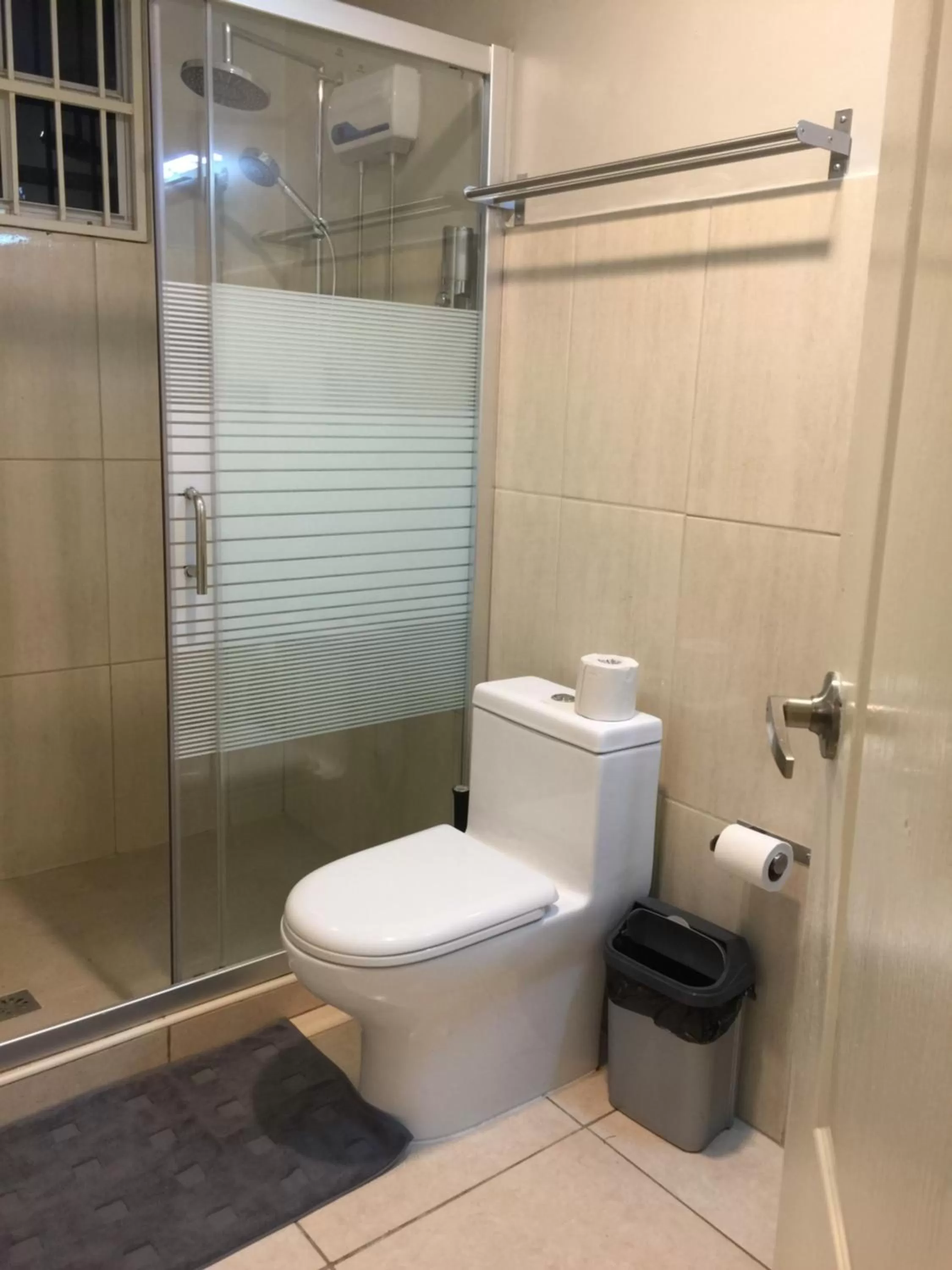 Toilet in The Pier Beach Inn & Suites