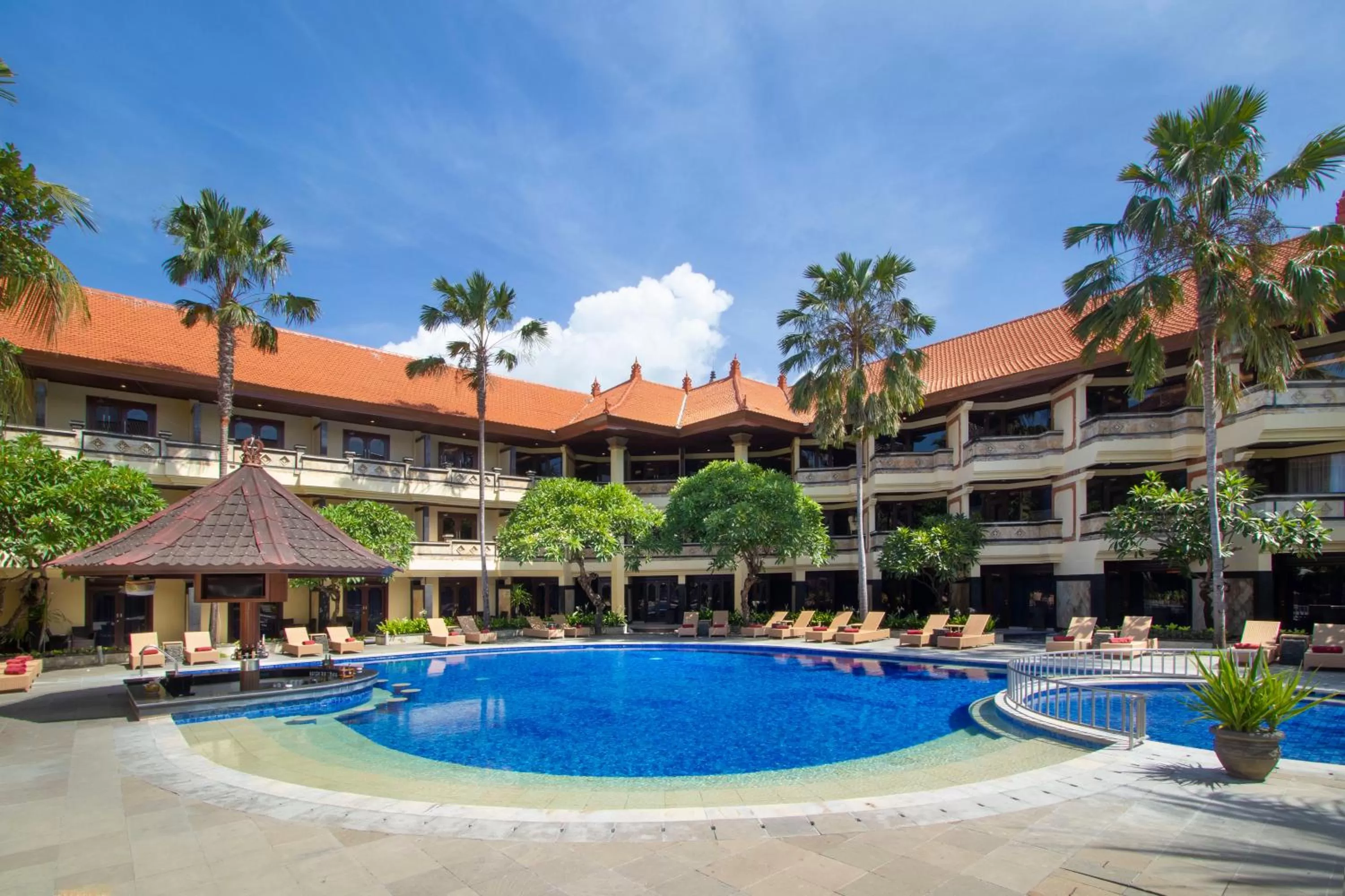 Swimming pool, Property Building in Grand Inna Kuta