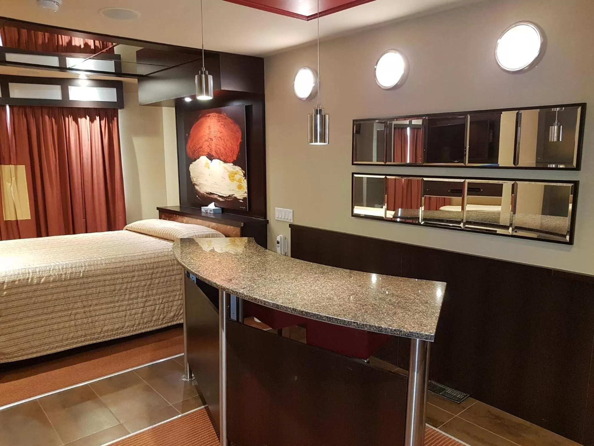 Lounge or bar, Bed in Le Chabrol Hotel & Suites