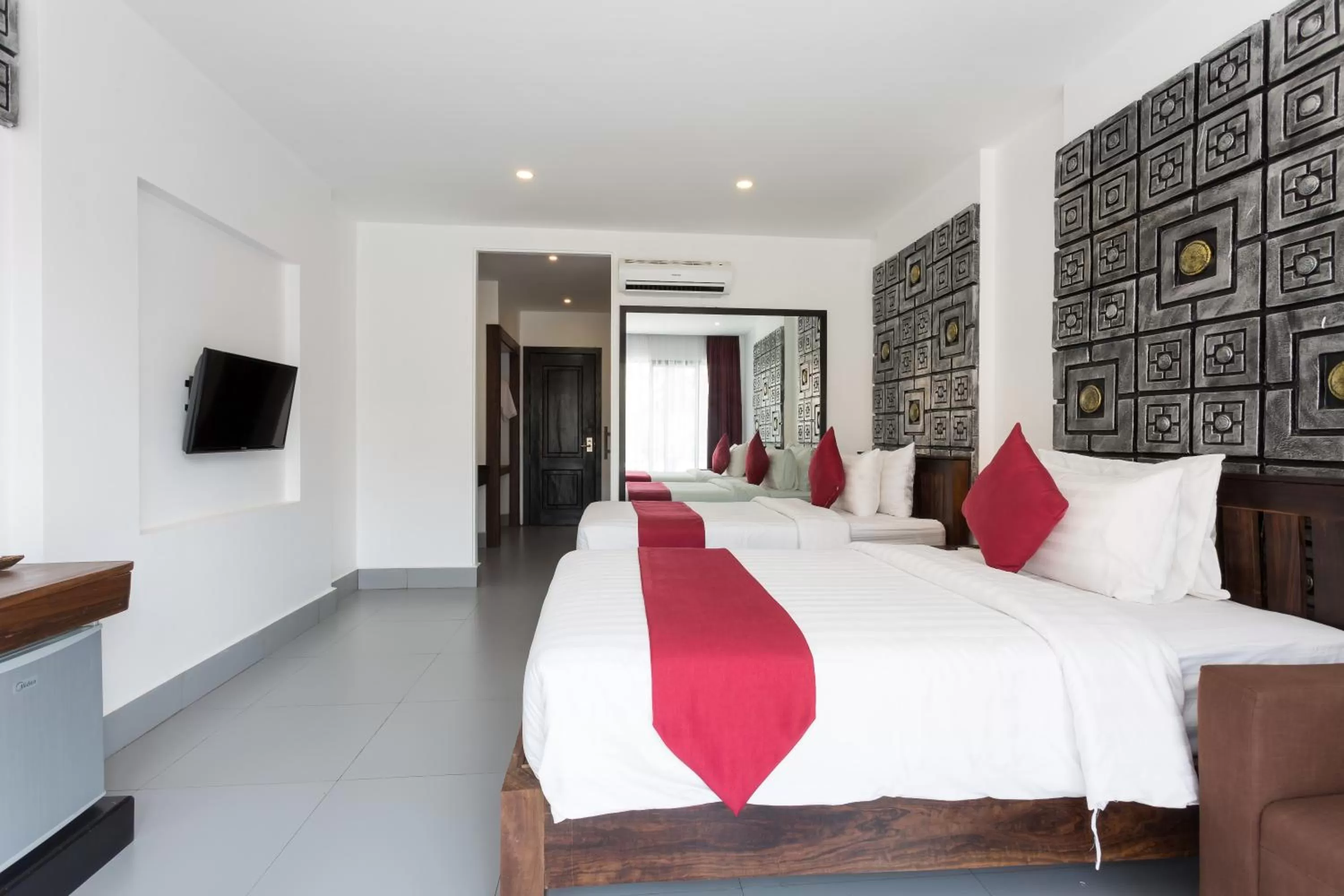 Bed in Ladear Privilege Rooms