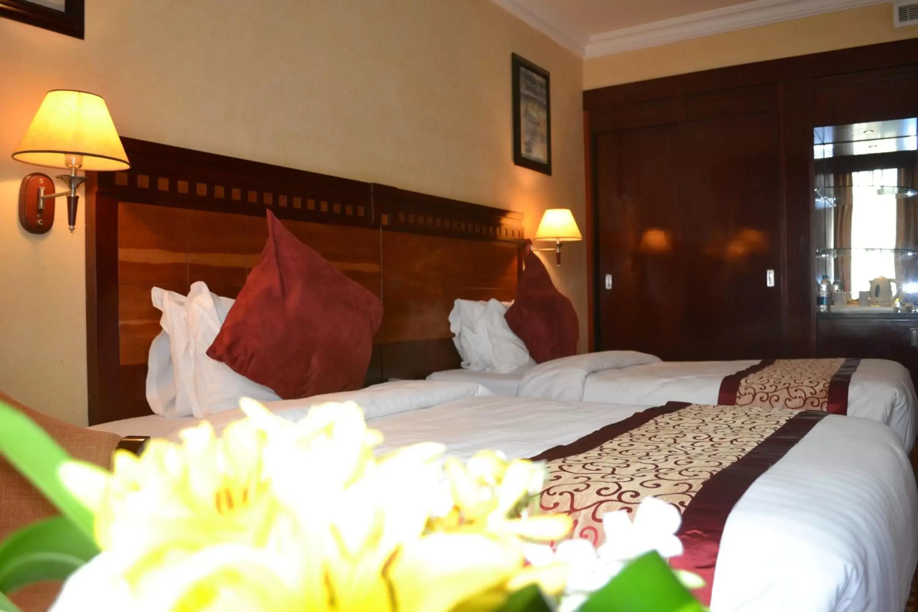 Bed in Ramada by Wyndham Hotel Riyadh