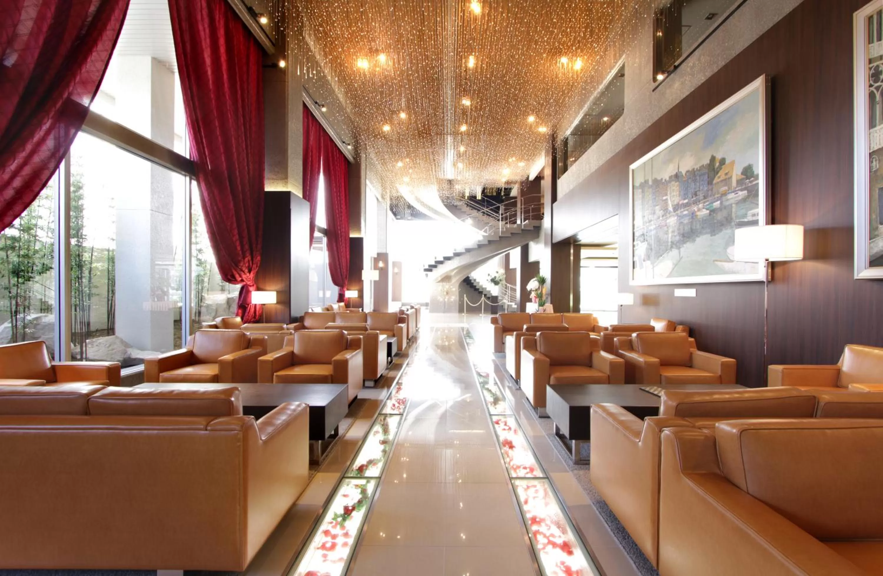 Communal lounge/ TV room in International Hotel Ube