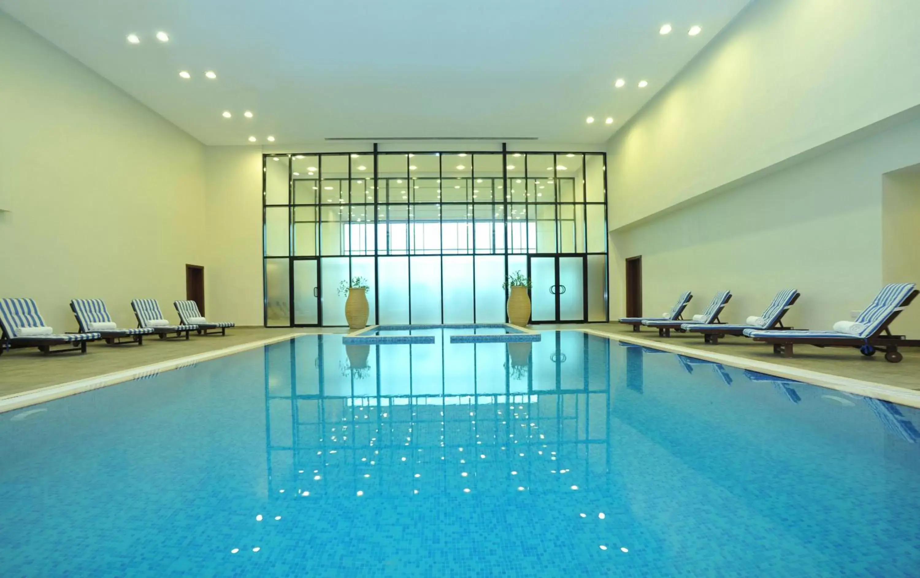 Swimming pool in Ramada Hotel & Suites by Wyndham Ajman Swimming pool in Ramada Hotel & Suites by Wyndham Ajman