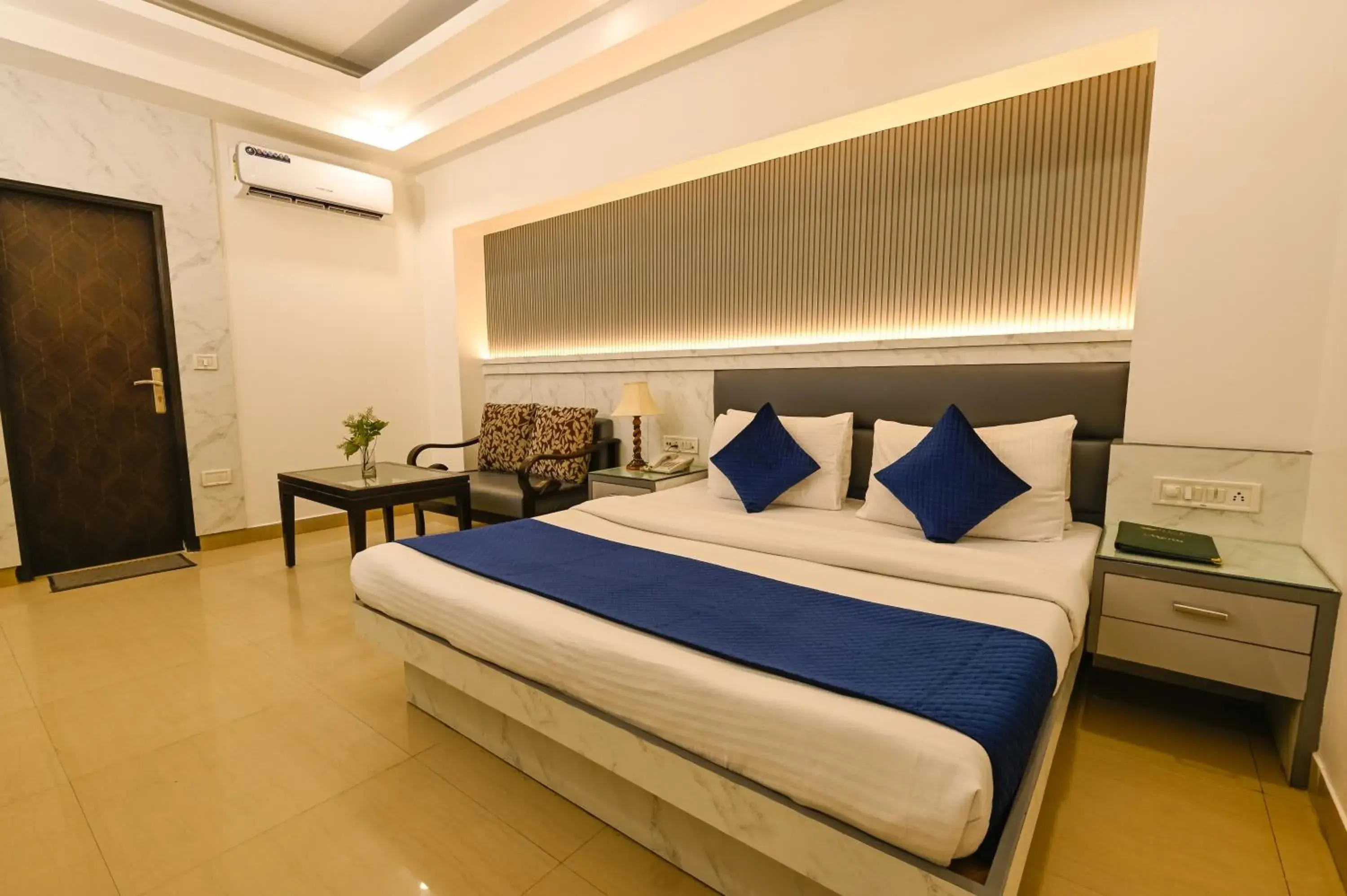 Photo of the whole room, Bed in Hotel Krishna Deluxe-By RCG Hotels
