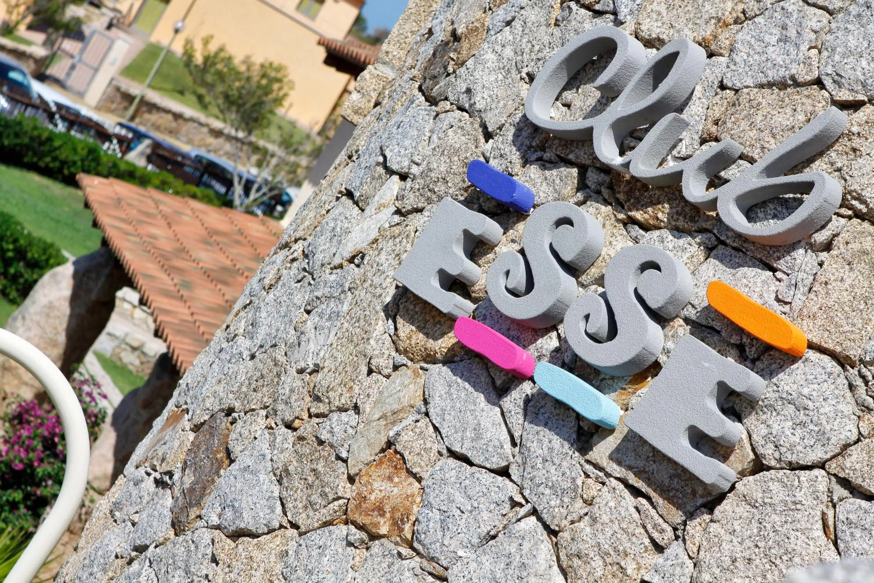 Property logo or sign in Club Esse Posada