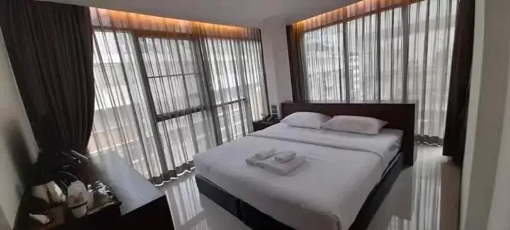 Photo of the whole room, Bed in The Bangkok Airport Link Suite - SHA Plus