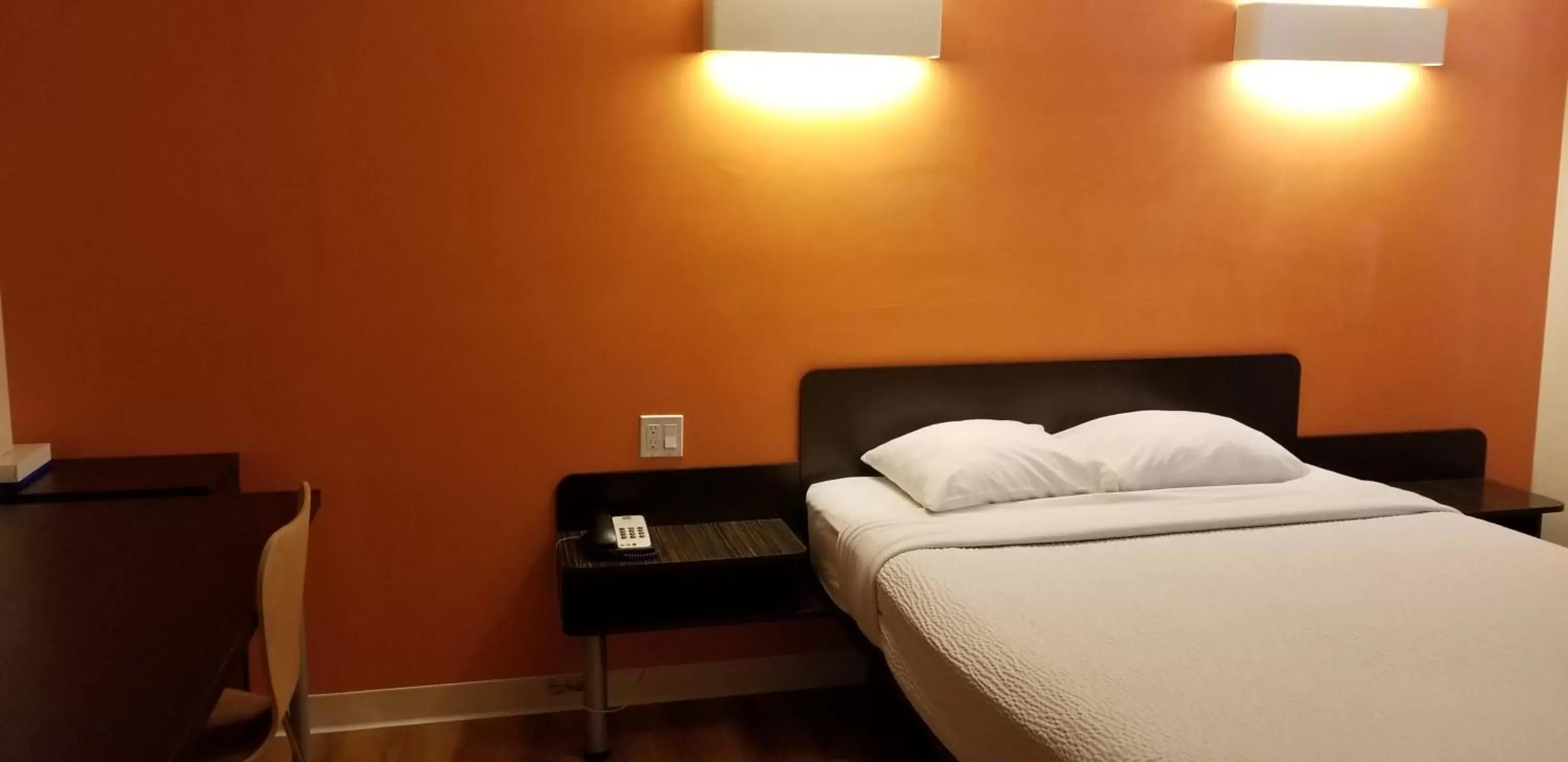 Bed in Motel 6-Innisfail, AB