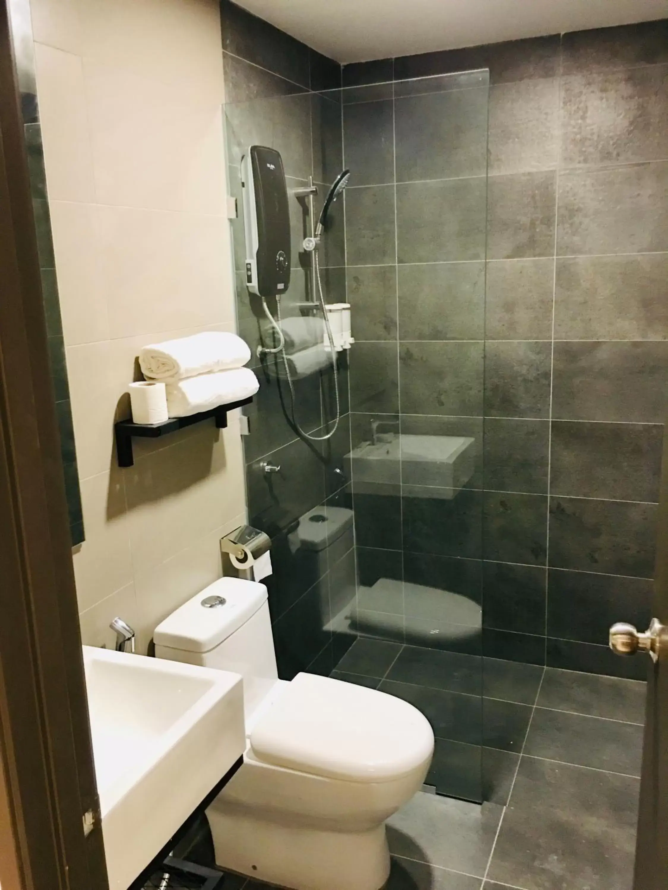 Bathroom in Enclave Hotel