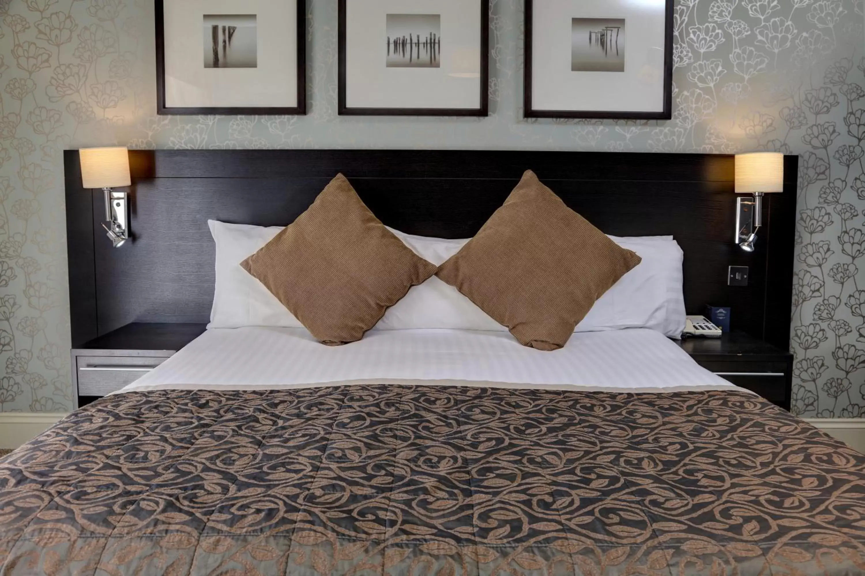 Bed in Norfolk Royale Hotel