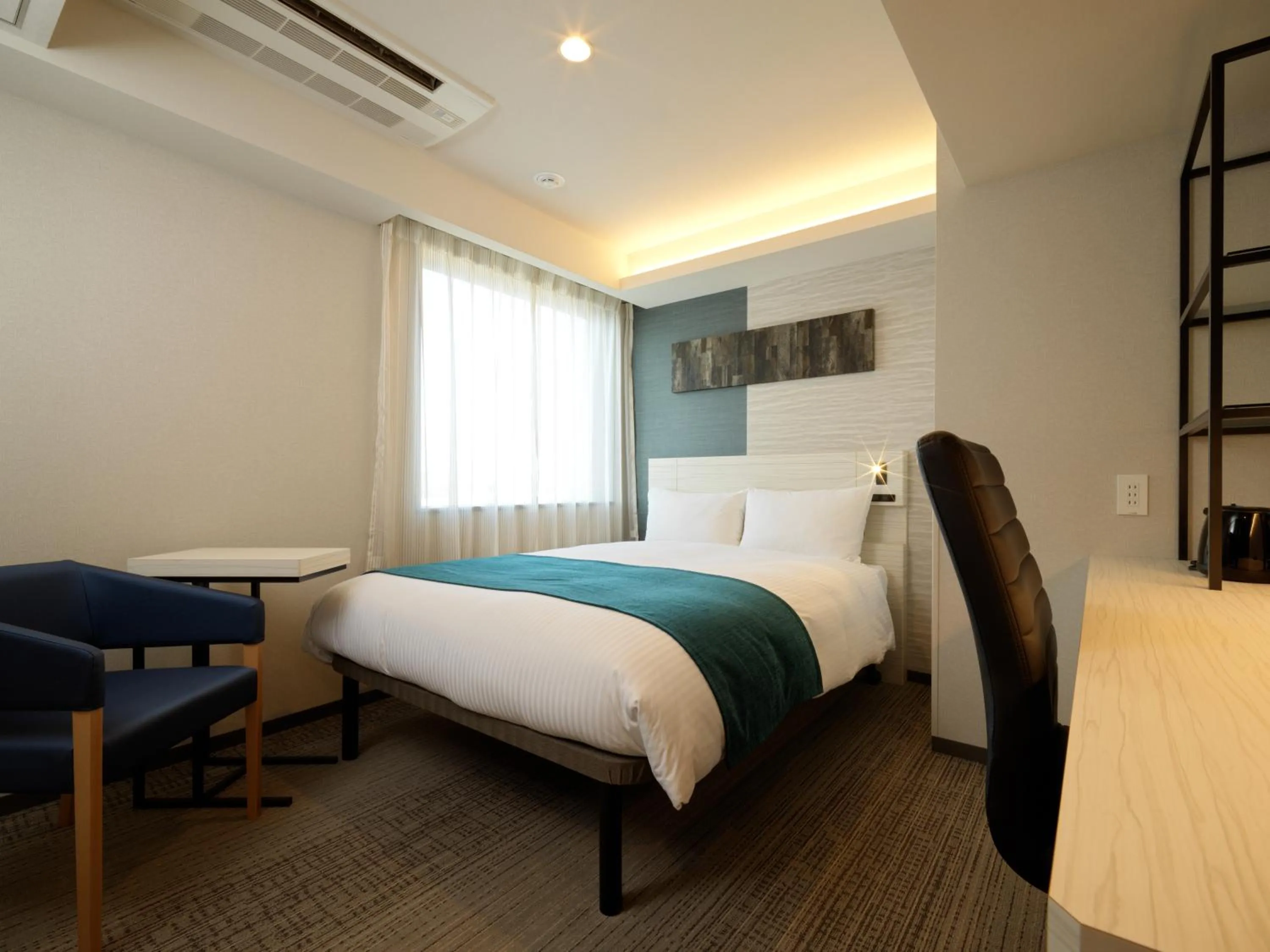 Photo of the whole room, Bed in Hotel Emisia Tokyo Tachikawa