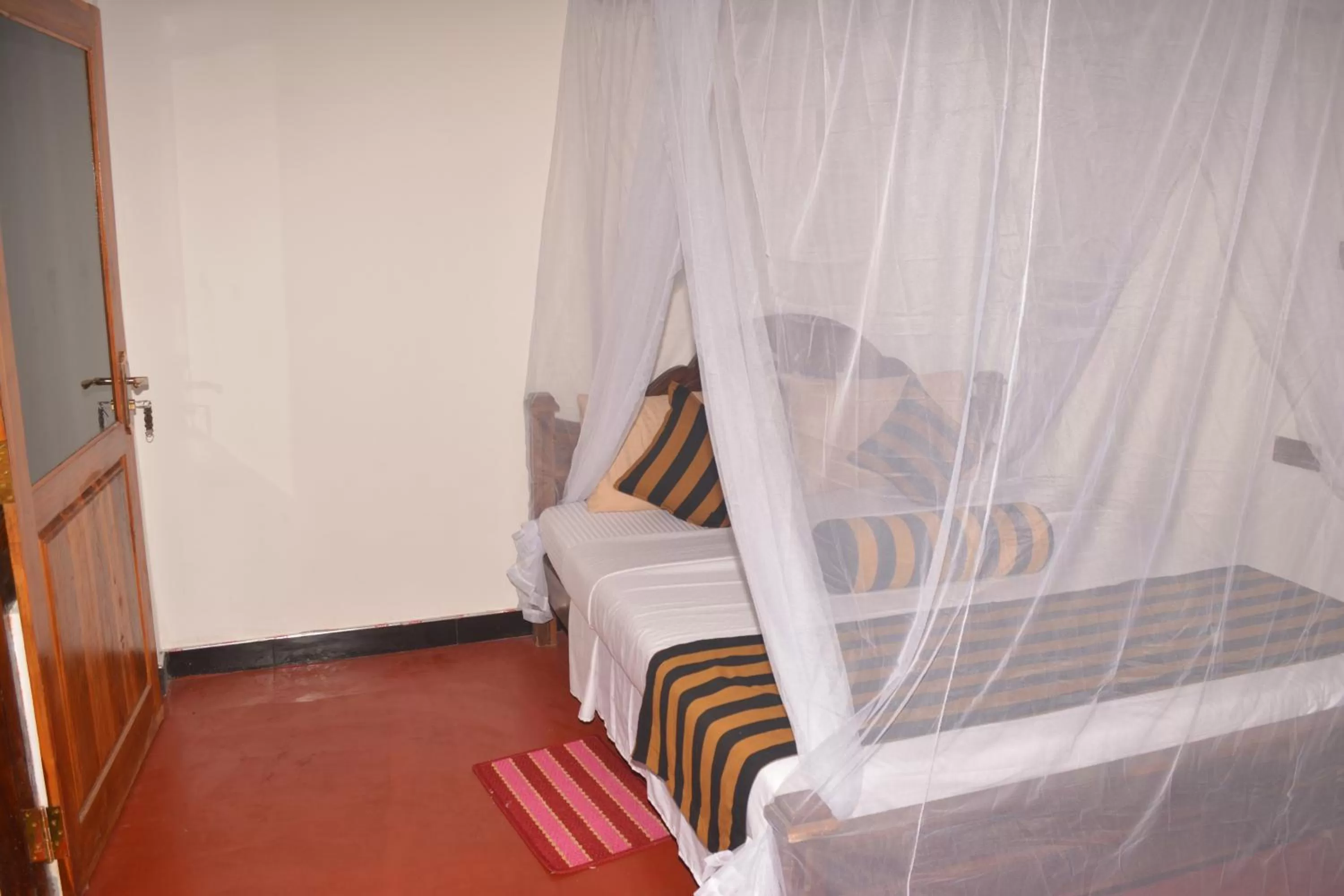 Bed in Ella River Face Inn