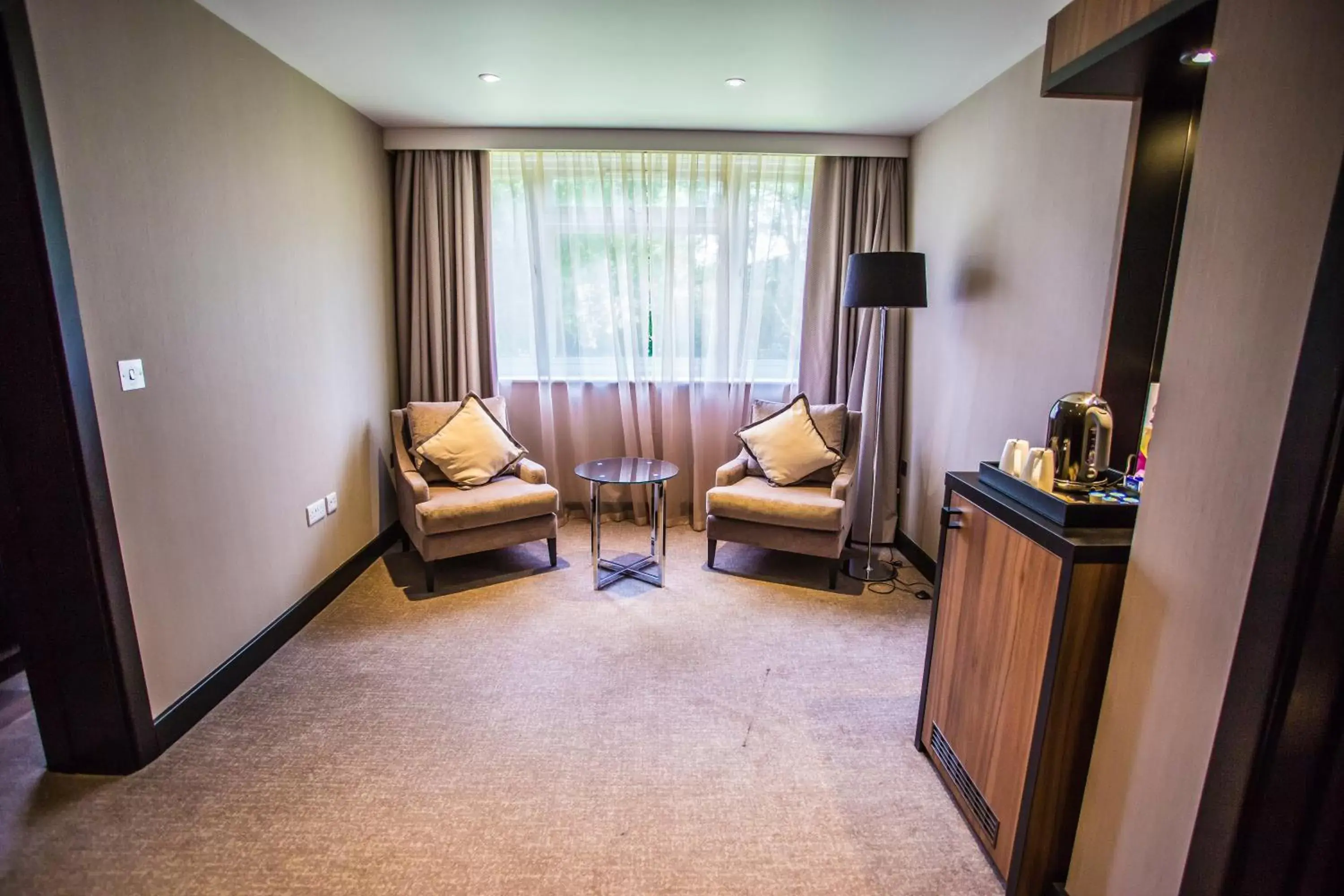 Living room, Seating Area in Crowne Plaza Gerrards Cross, an IHG Hotel