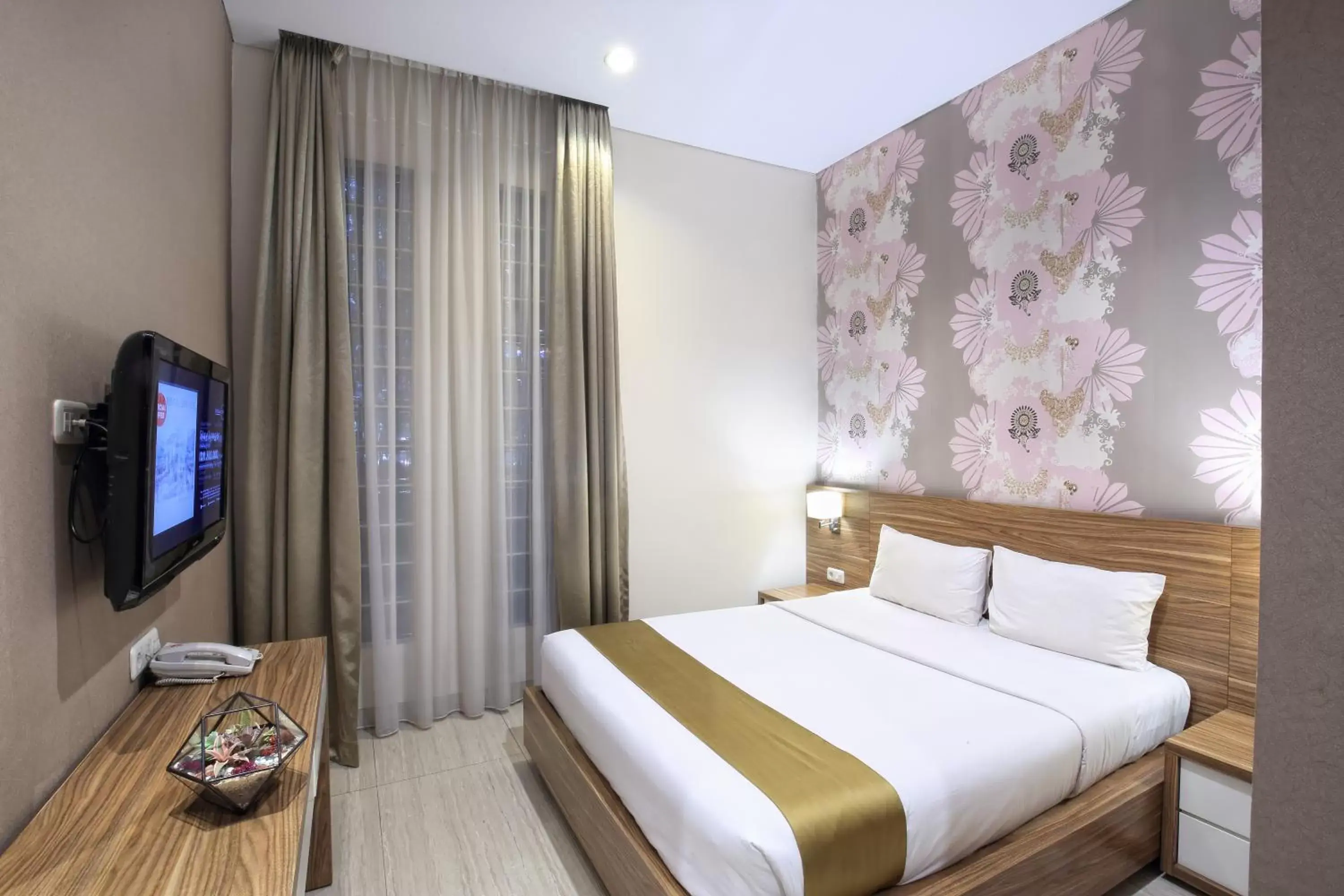 Bed in Rasuna Icon Hotel
