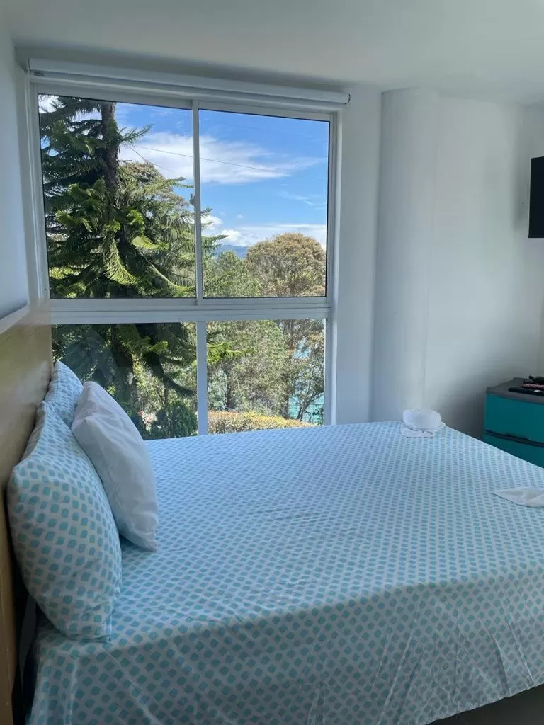 Bed in Paradise Lake Finca Hotel