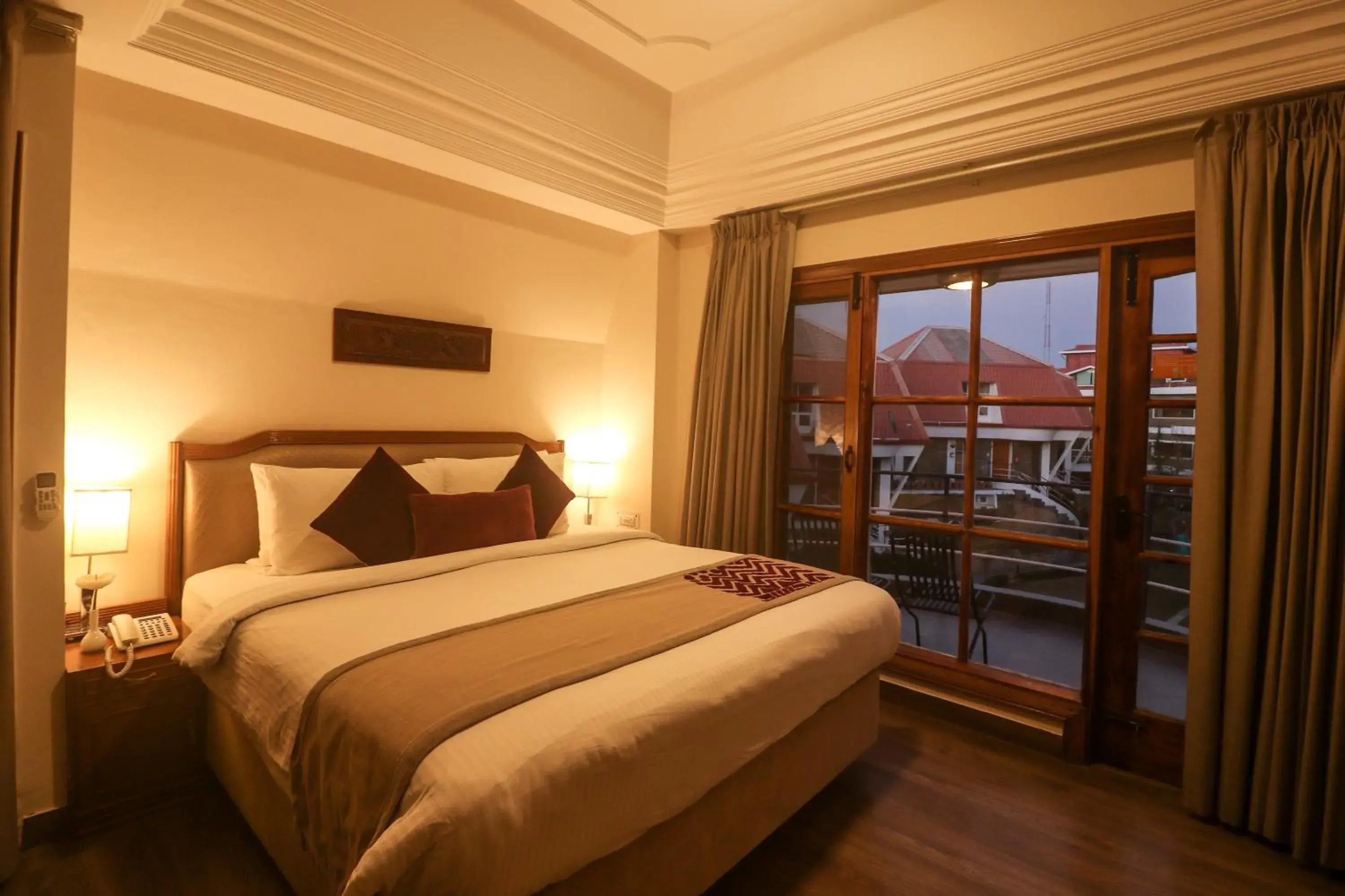 Photo of the whole room, Bed in Marigold Sarovar Portico Shimla