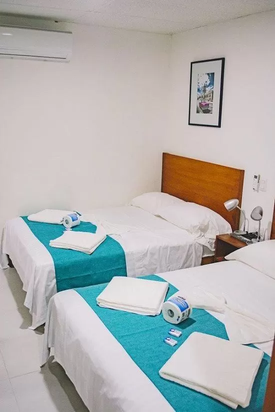 Bed in Casa de huéspedes Taino