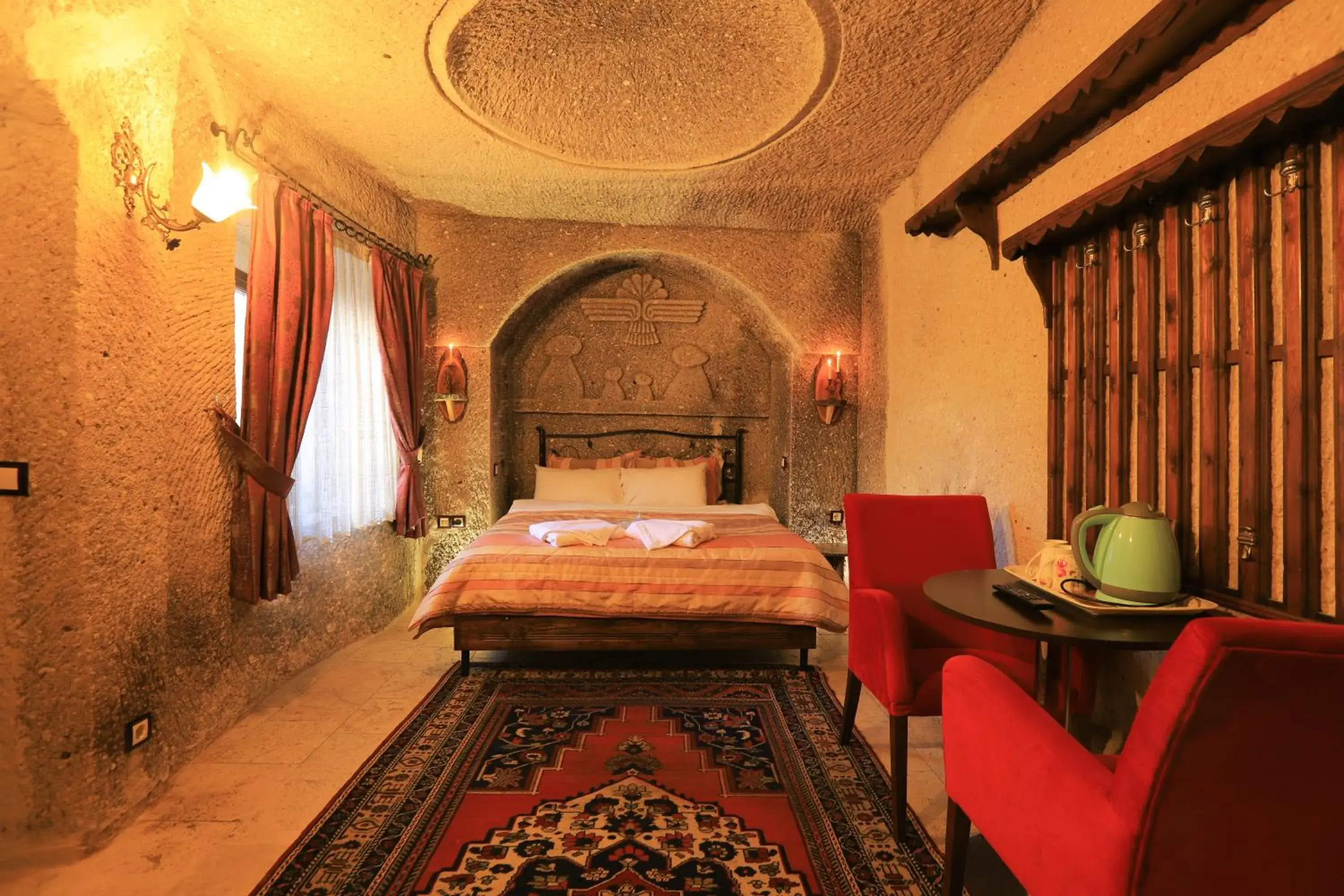 Property building, Bed in Antique Terrace Cave Suites Property building, Bed in Antique Terrace Cave Suites