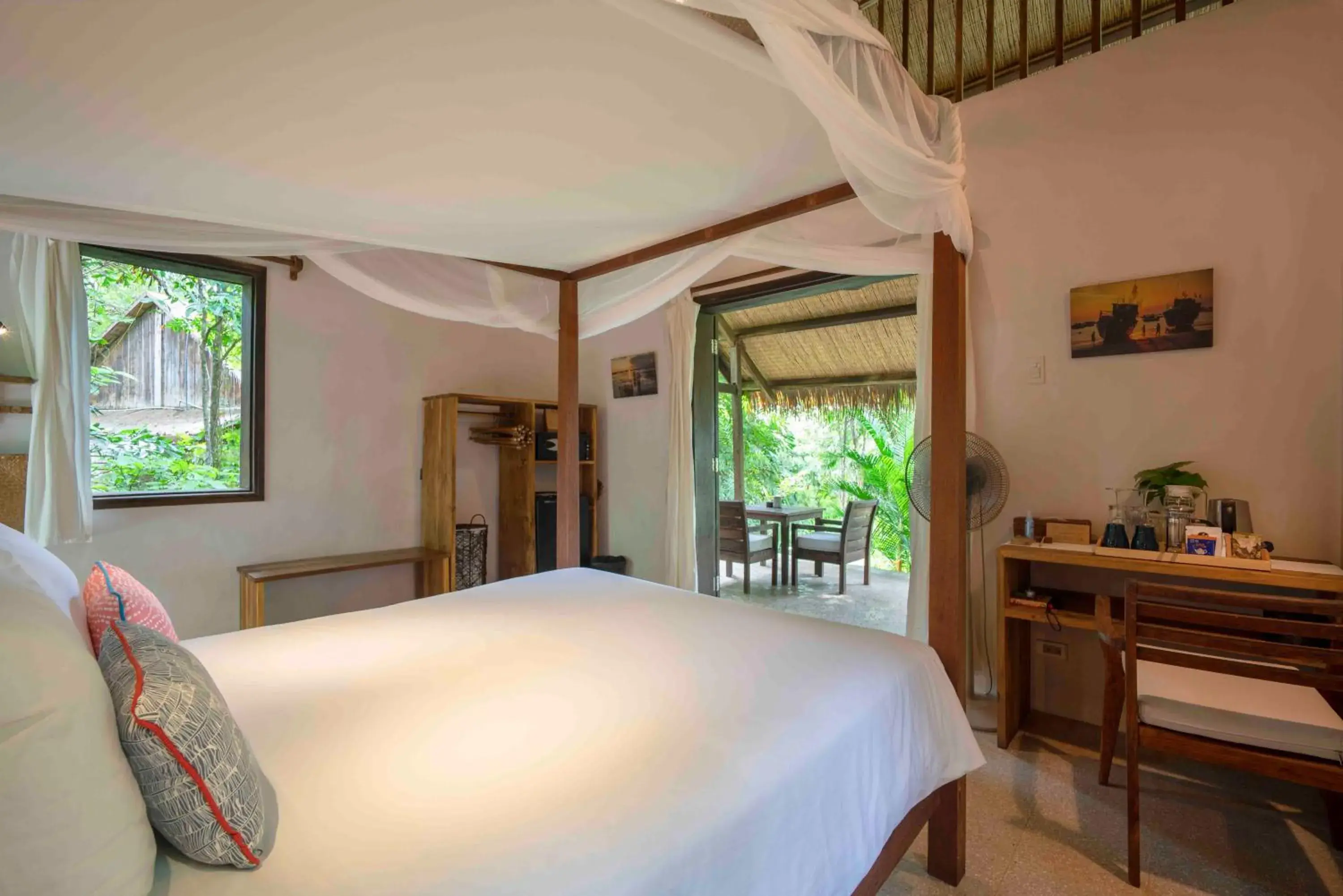 Bed in Mango Bay Resort