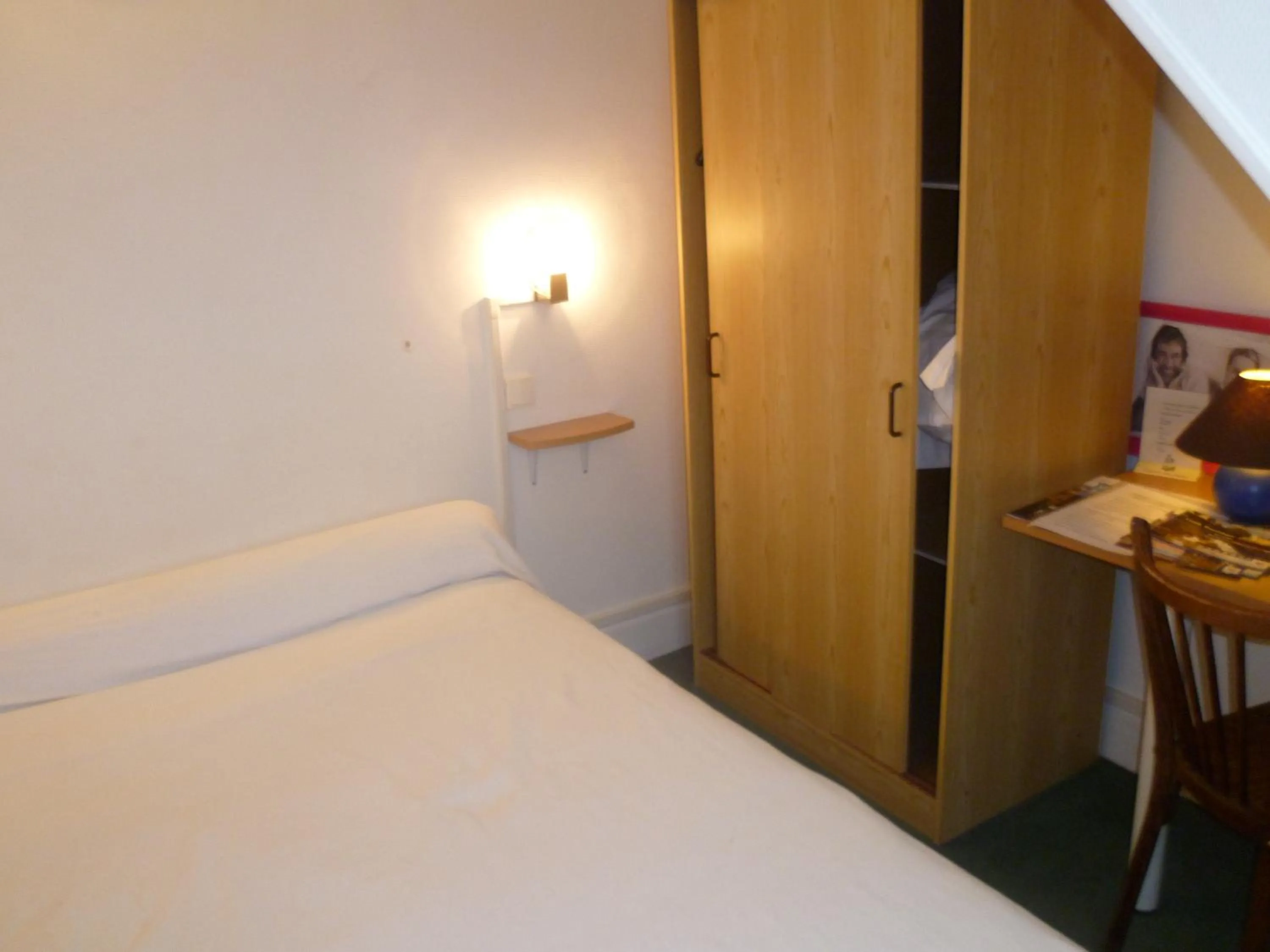 Bedroom, Bed in Hôtel Beauséjour