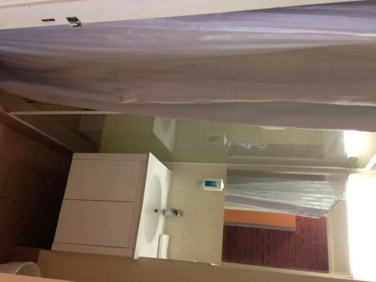 Toilet, Bathroom in Budget Motel