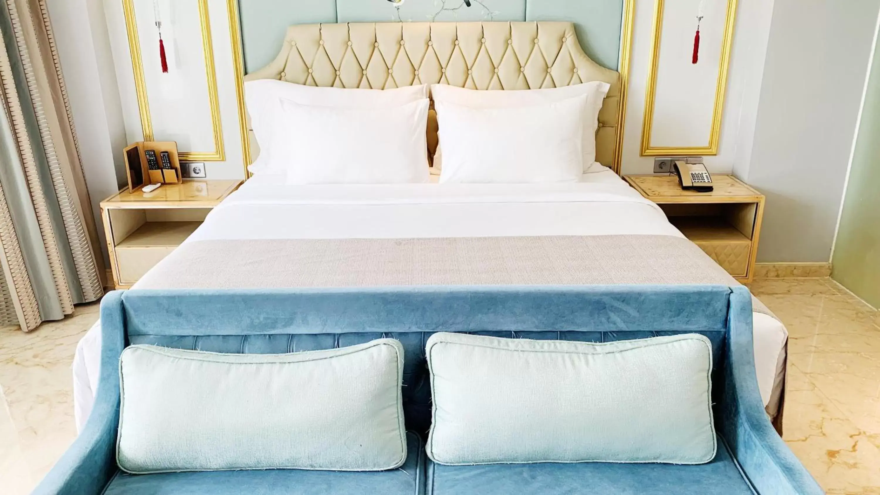 Bed in Art Deco Luxury Hotel & Residence