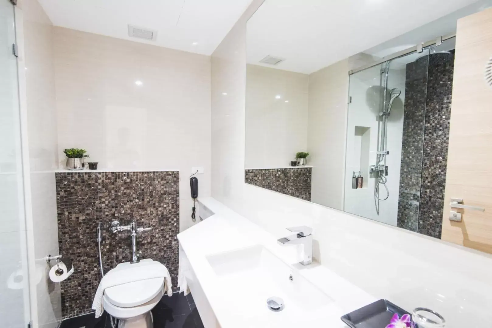 Bathroom in twothree a homely hotel - SHA Extra Plus