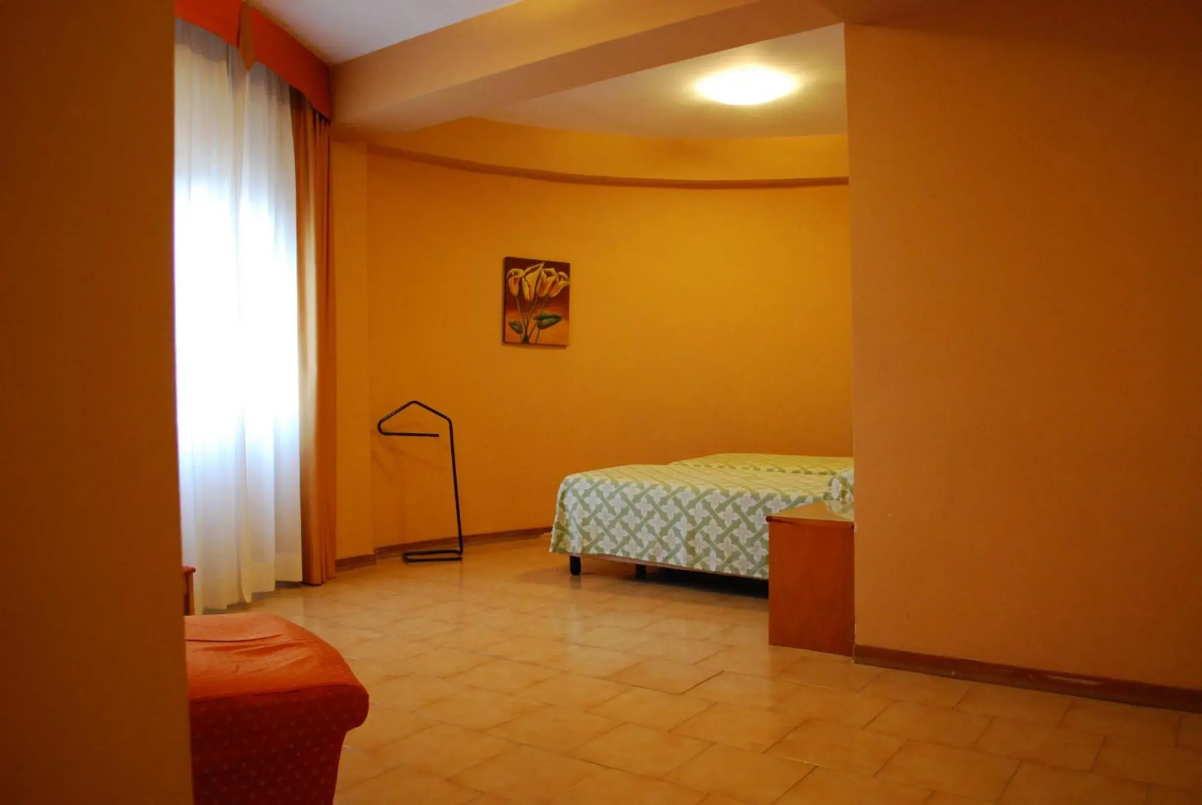 Seating area, Bed in Hotel Tre Torri