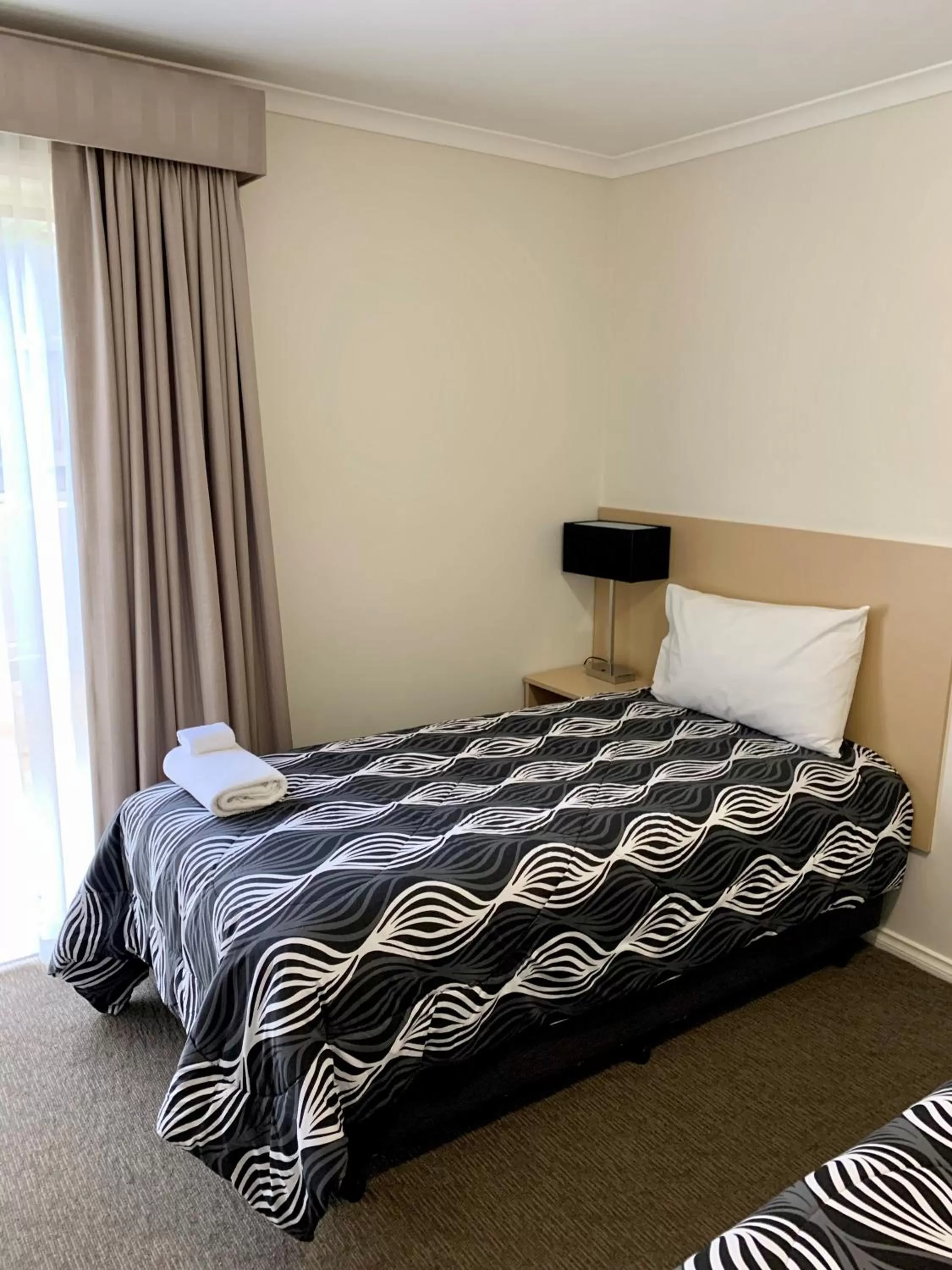 Bed in Seahorse Motel Cowes