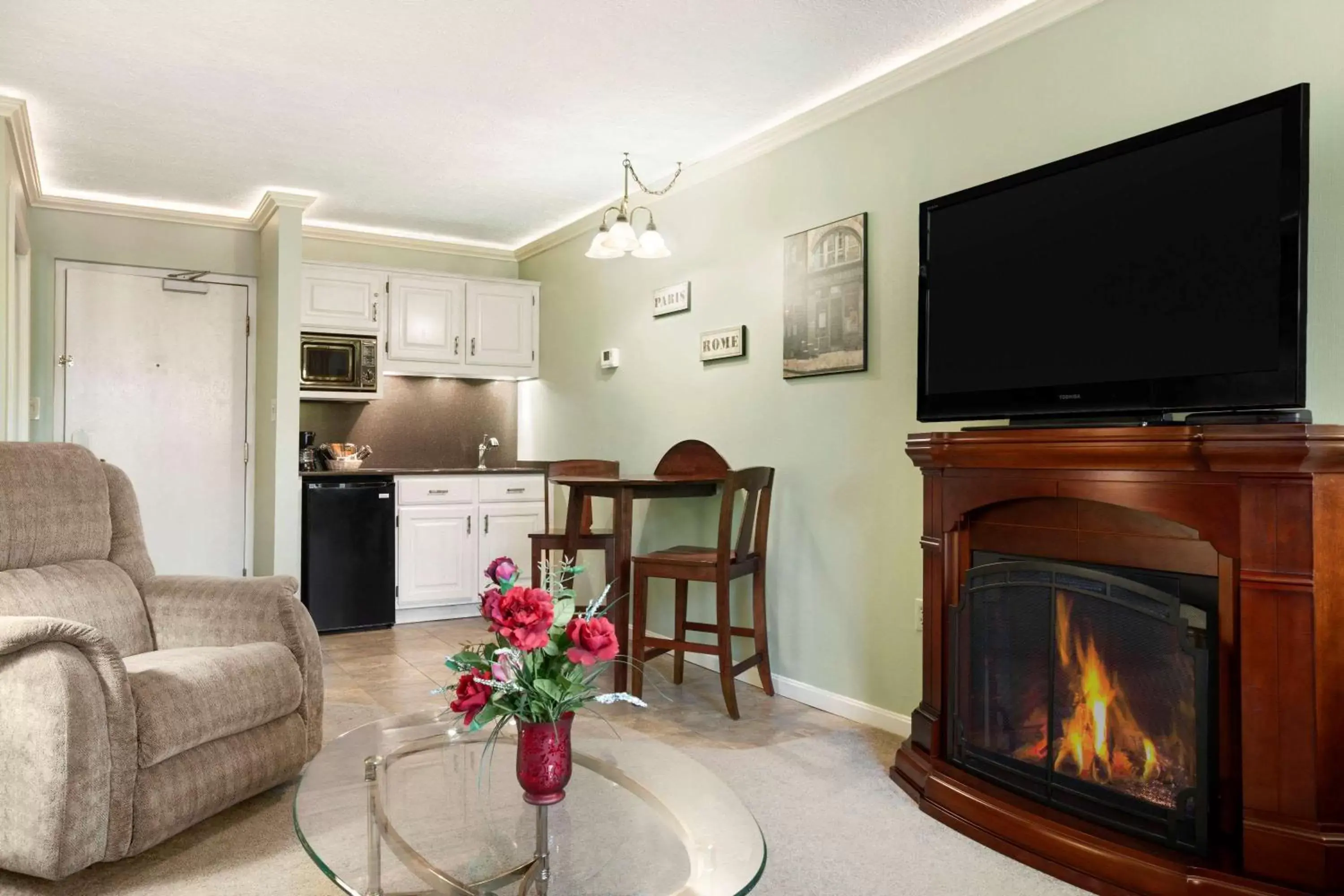 Photo of the whole room, TV/Entertainment Center in Ramada Hotel & Conference Center by Wyndham Lewiston