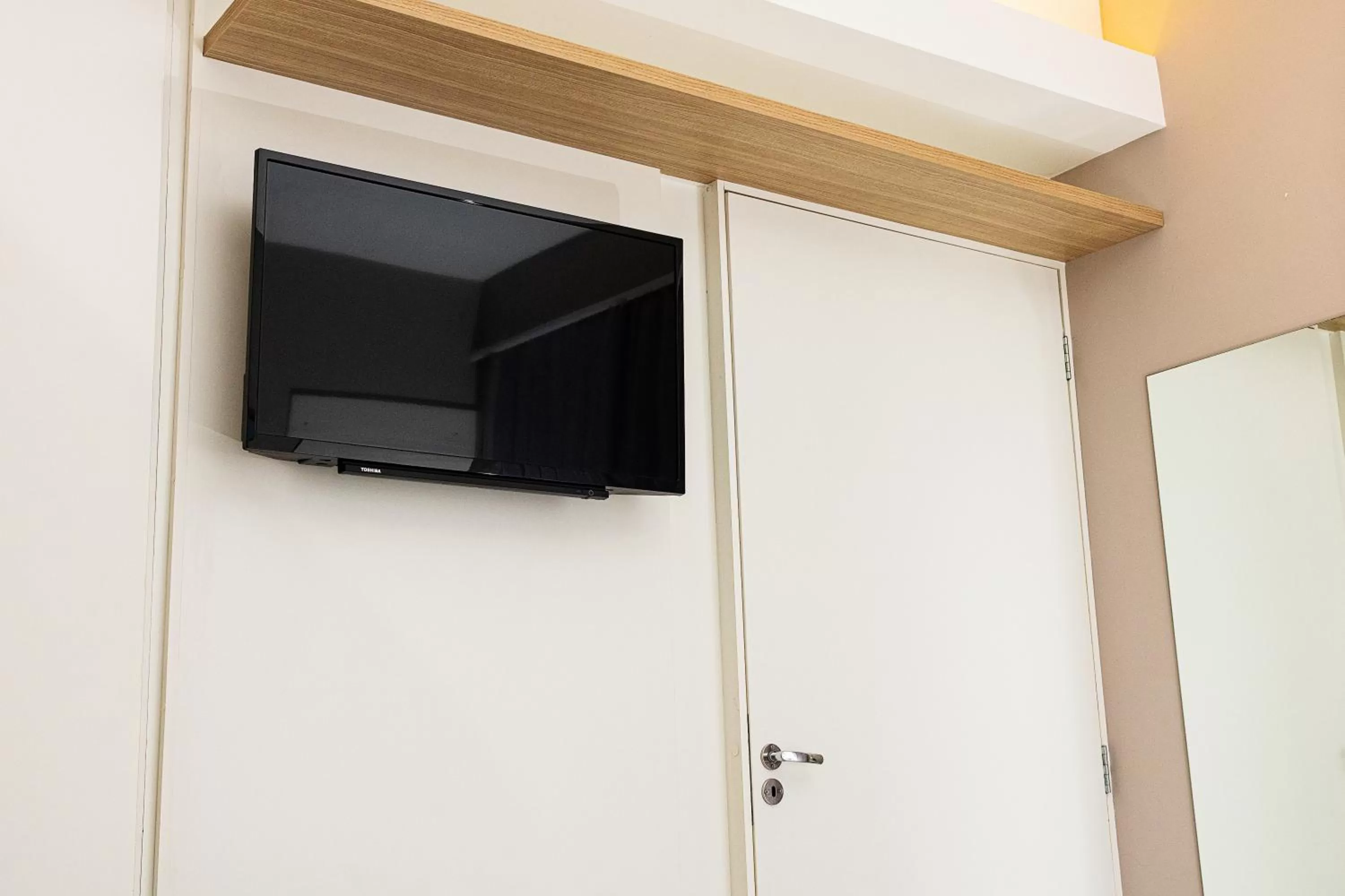 TV and multimedia in Ilhasul Hotel Residencia