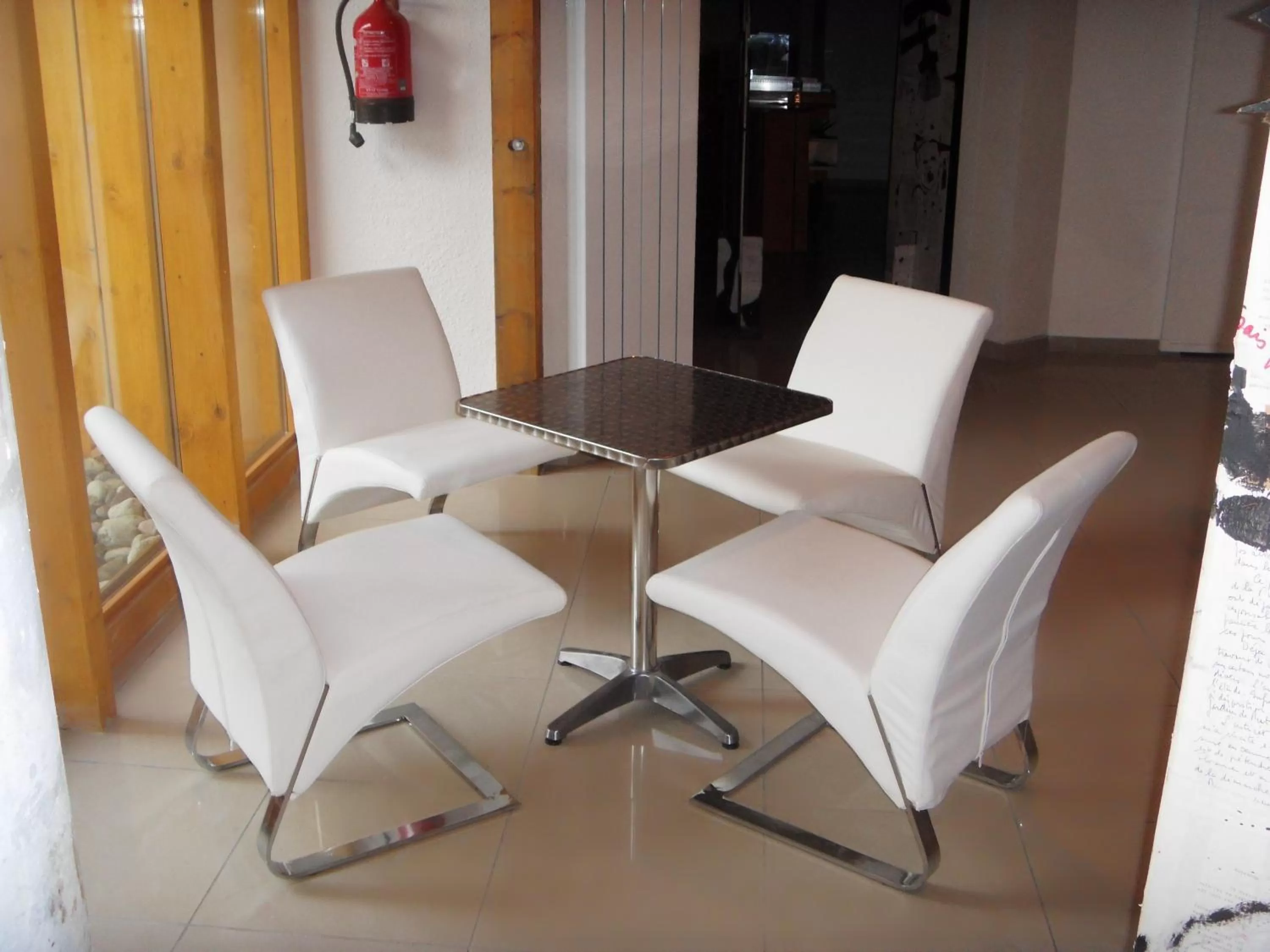 Lobby or reception in Hôtel Eco Logis Espace Bellevue