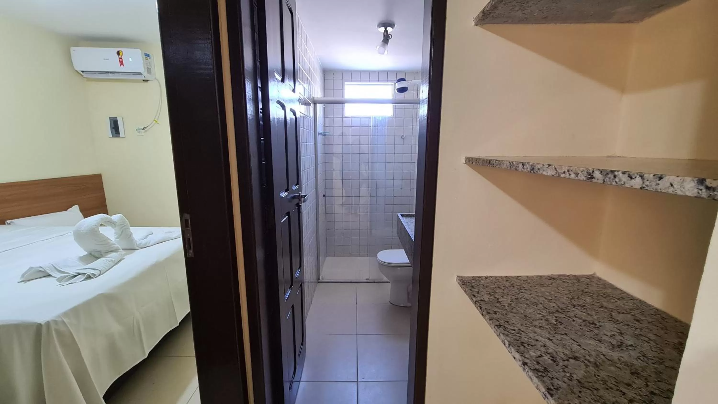 Bedroom in Arena Carneiros Hotel by AFT