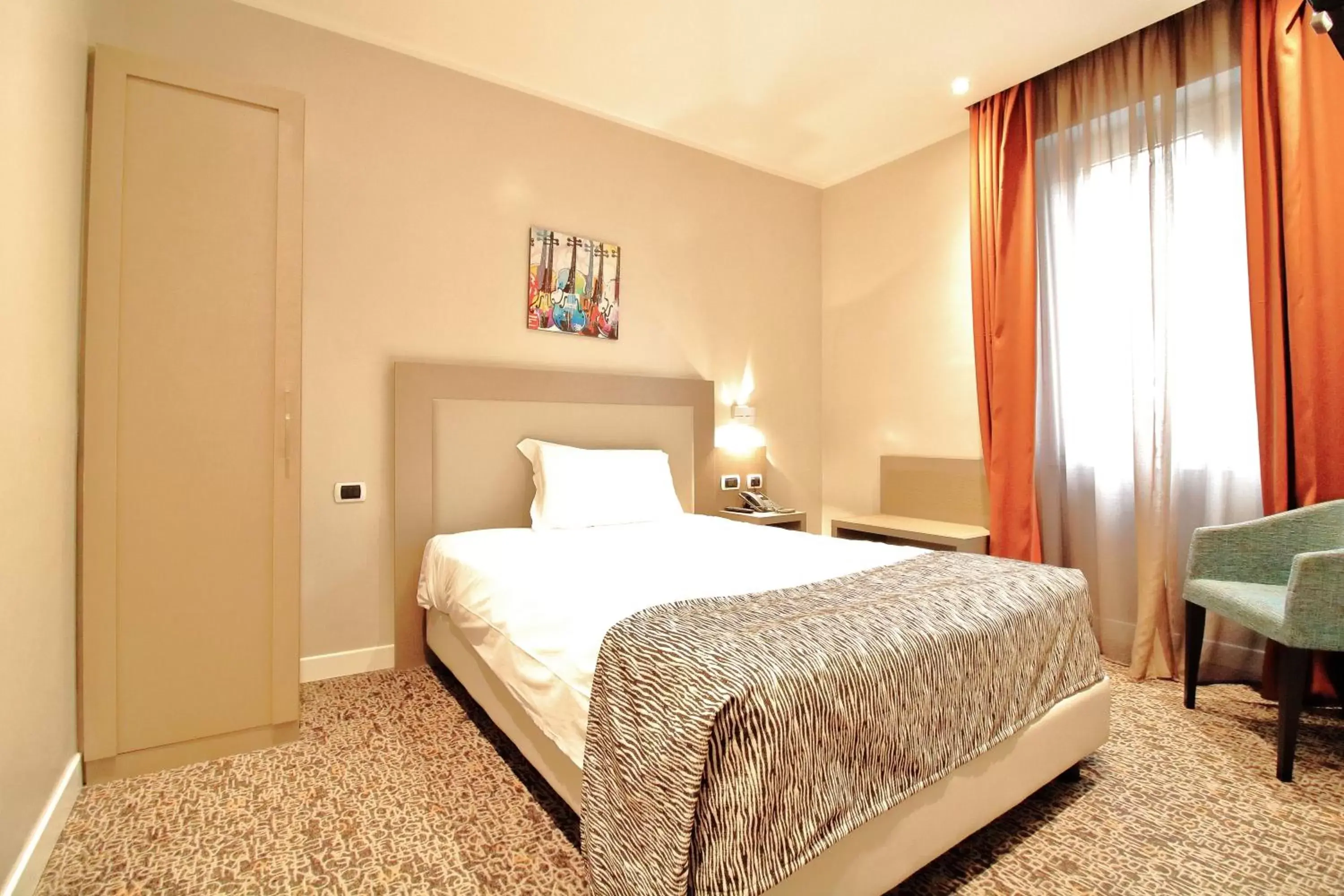 Bedroom in Noba Hotel e Residenze