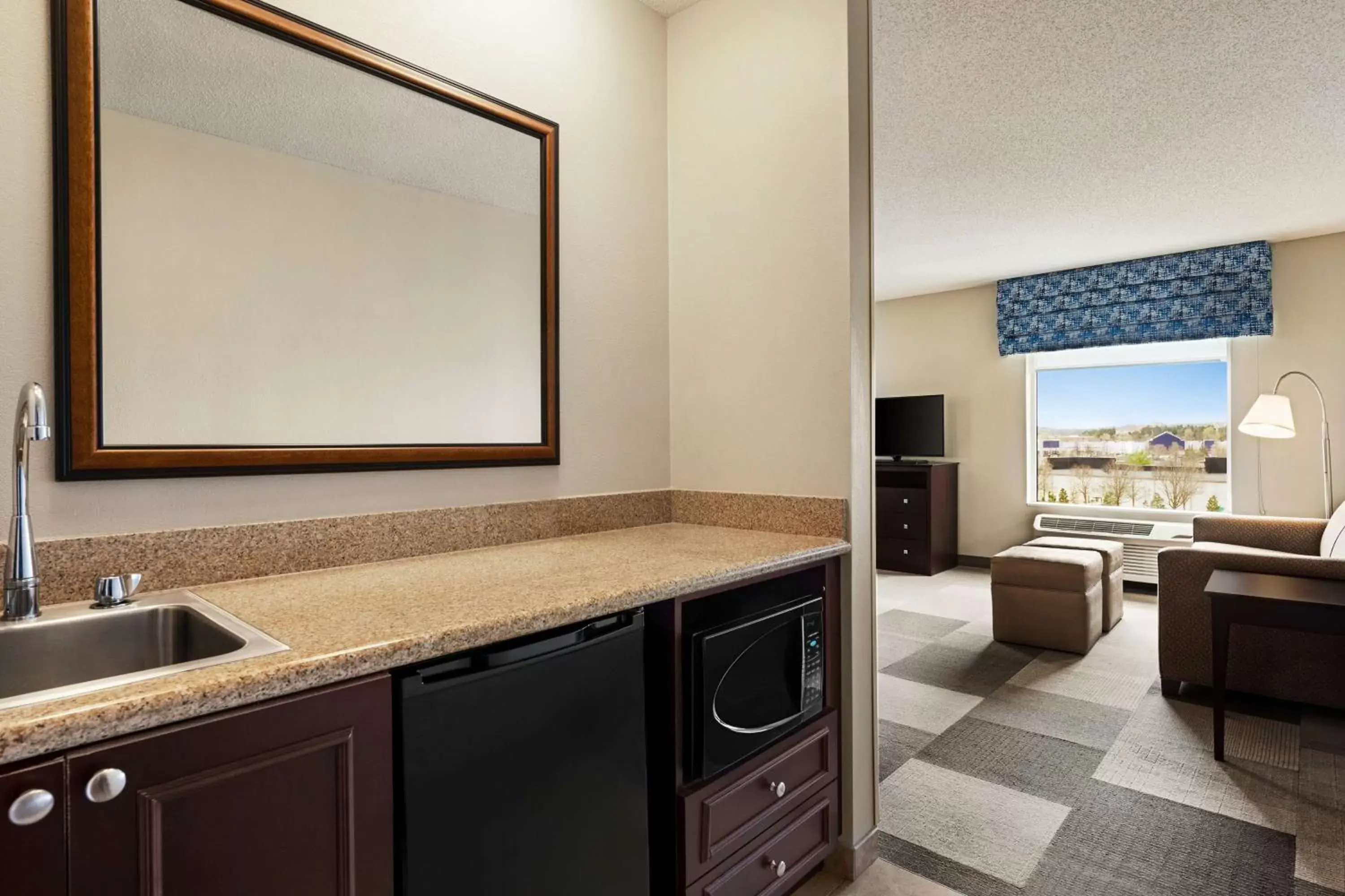 Photo of the whole room, Kitchen/Kitchenette in Hampton Inn & Suites Atlanta Airport West Camp Creek Pkwy