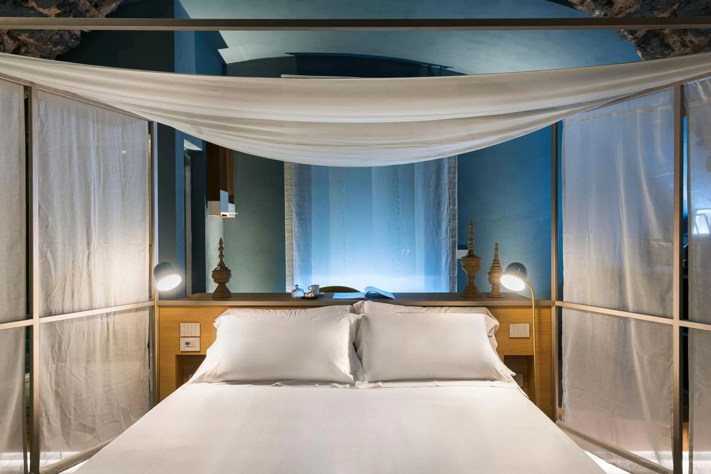 Bed in BASTIÒ PRIVATE SUITES