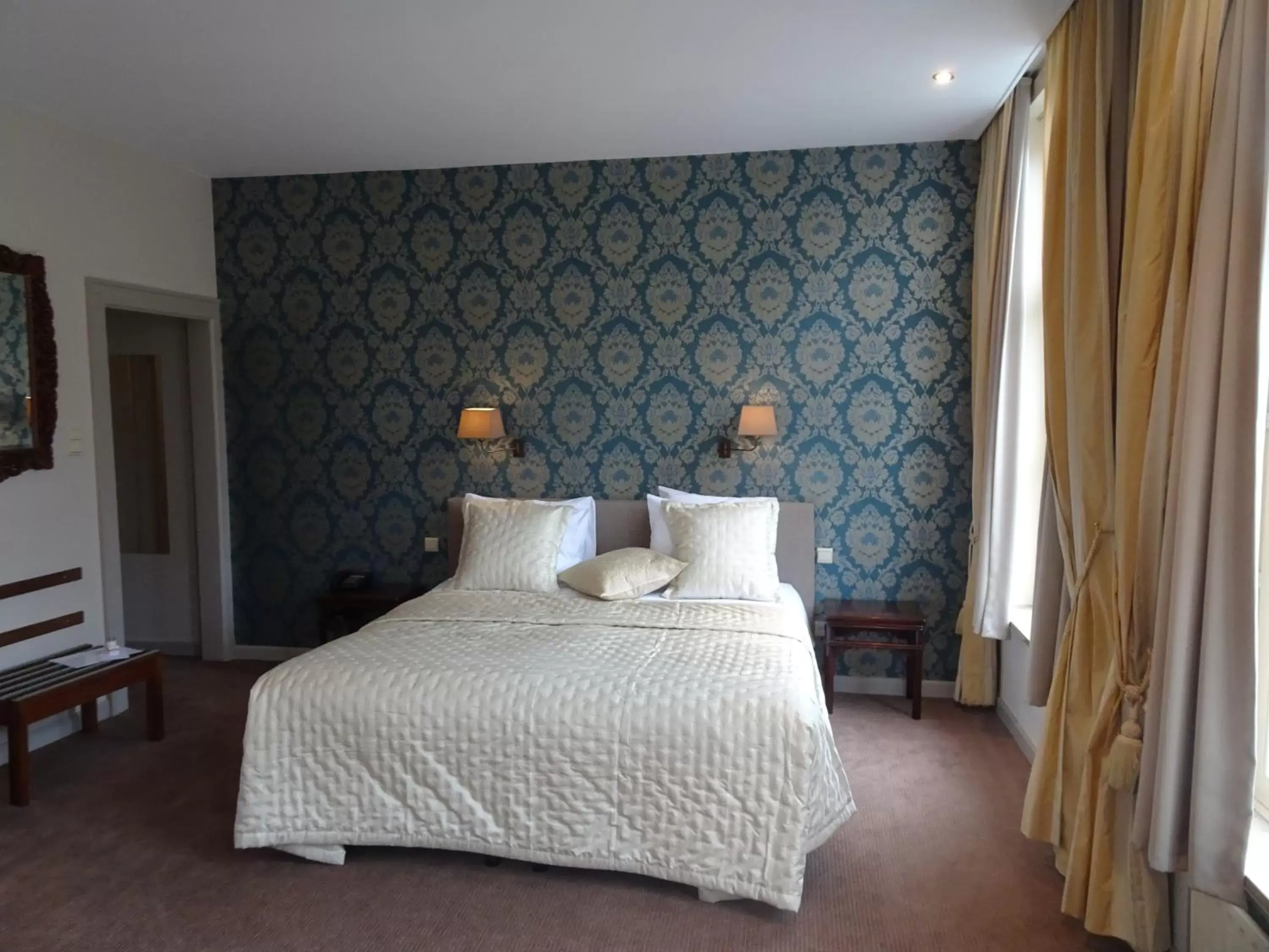 Bed in Hotel Duc De Bourgogne