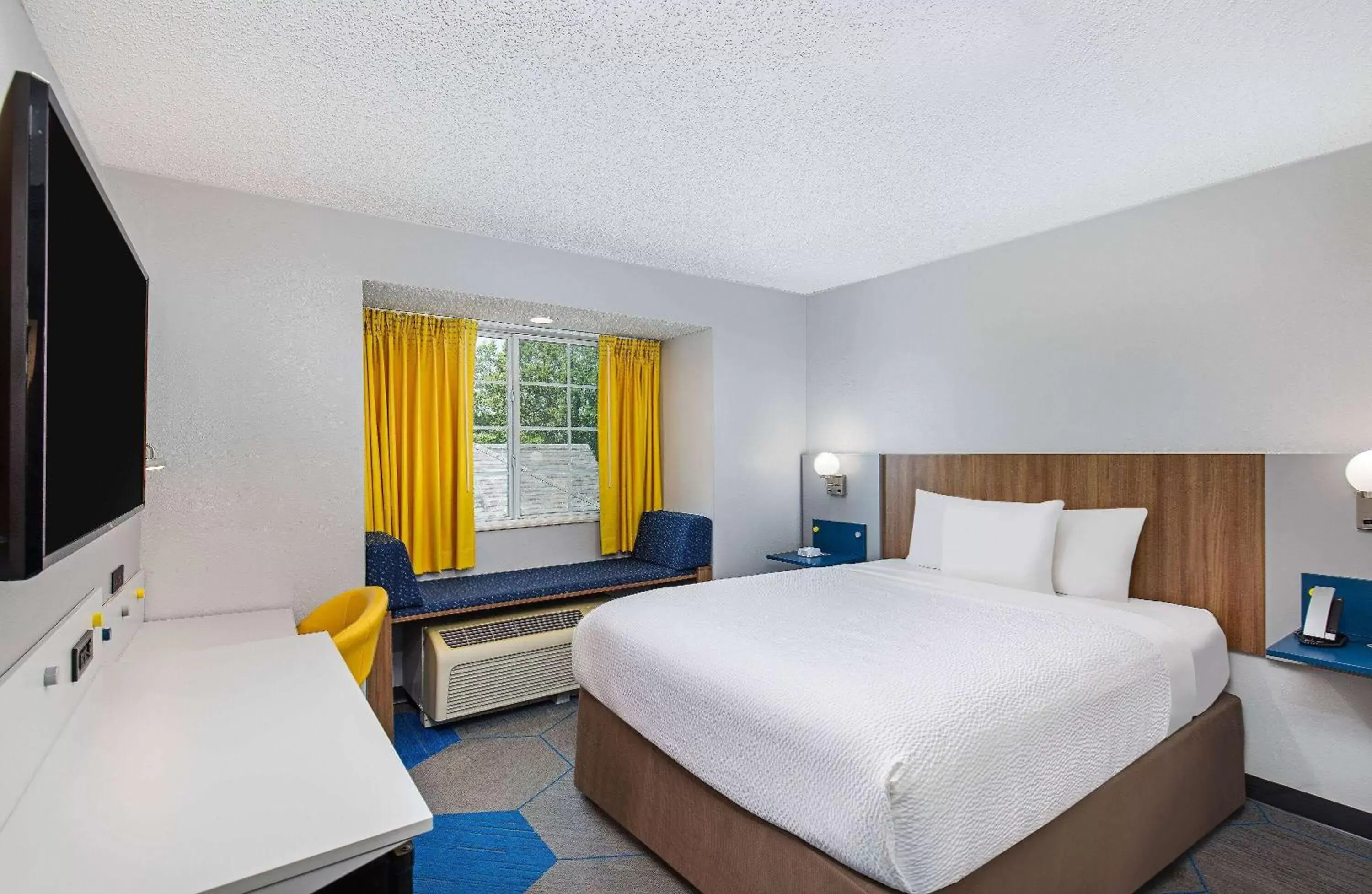 Photo of the whole room, Bed in Microtel Inn & Suites Columbus North