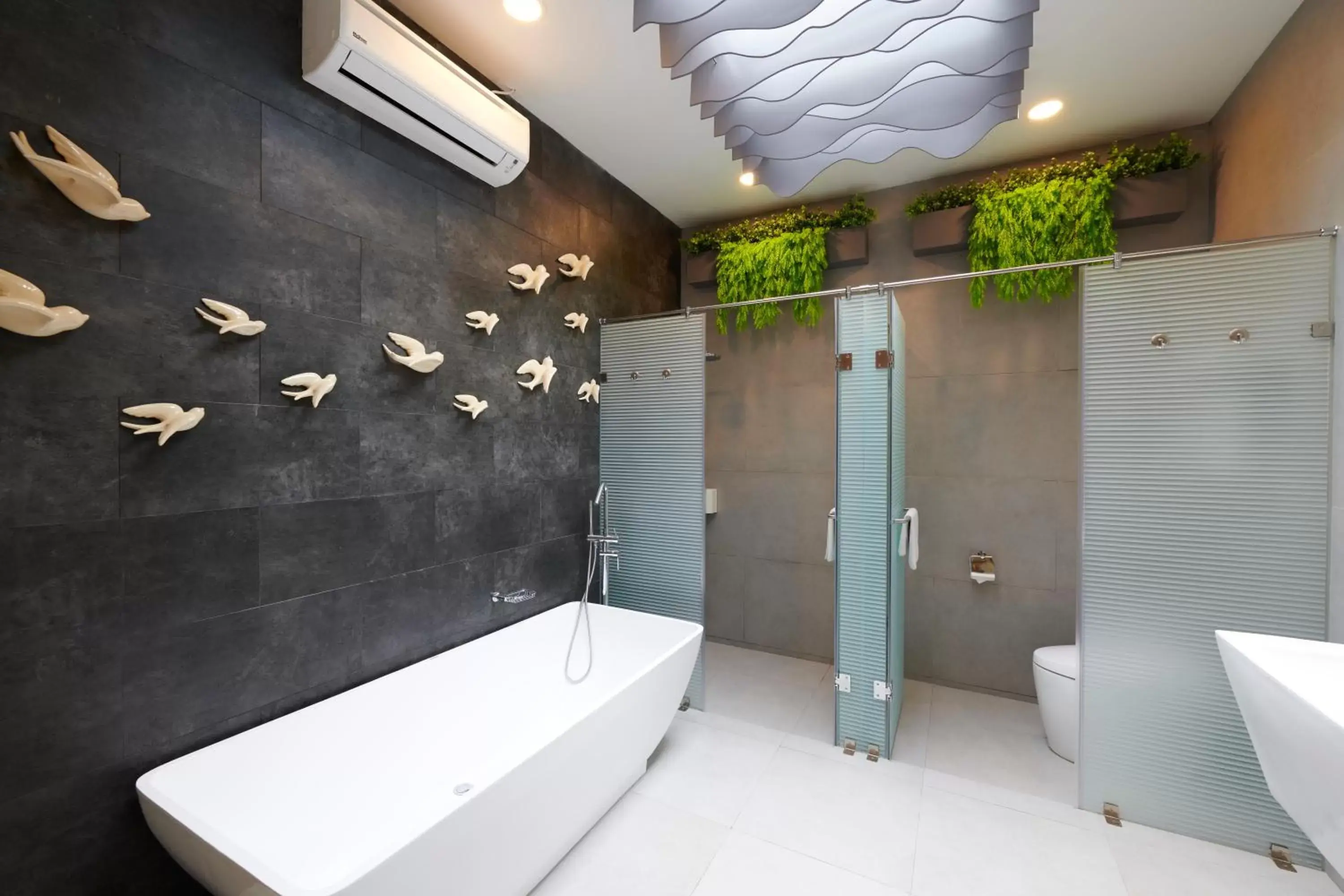 Bathroom in Verse Luxe Hotel Wahid Hasyim