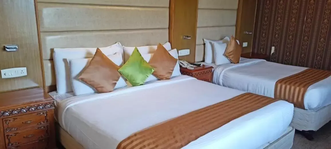 Bed in Ideal Beach Resort