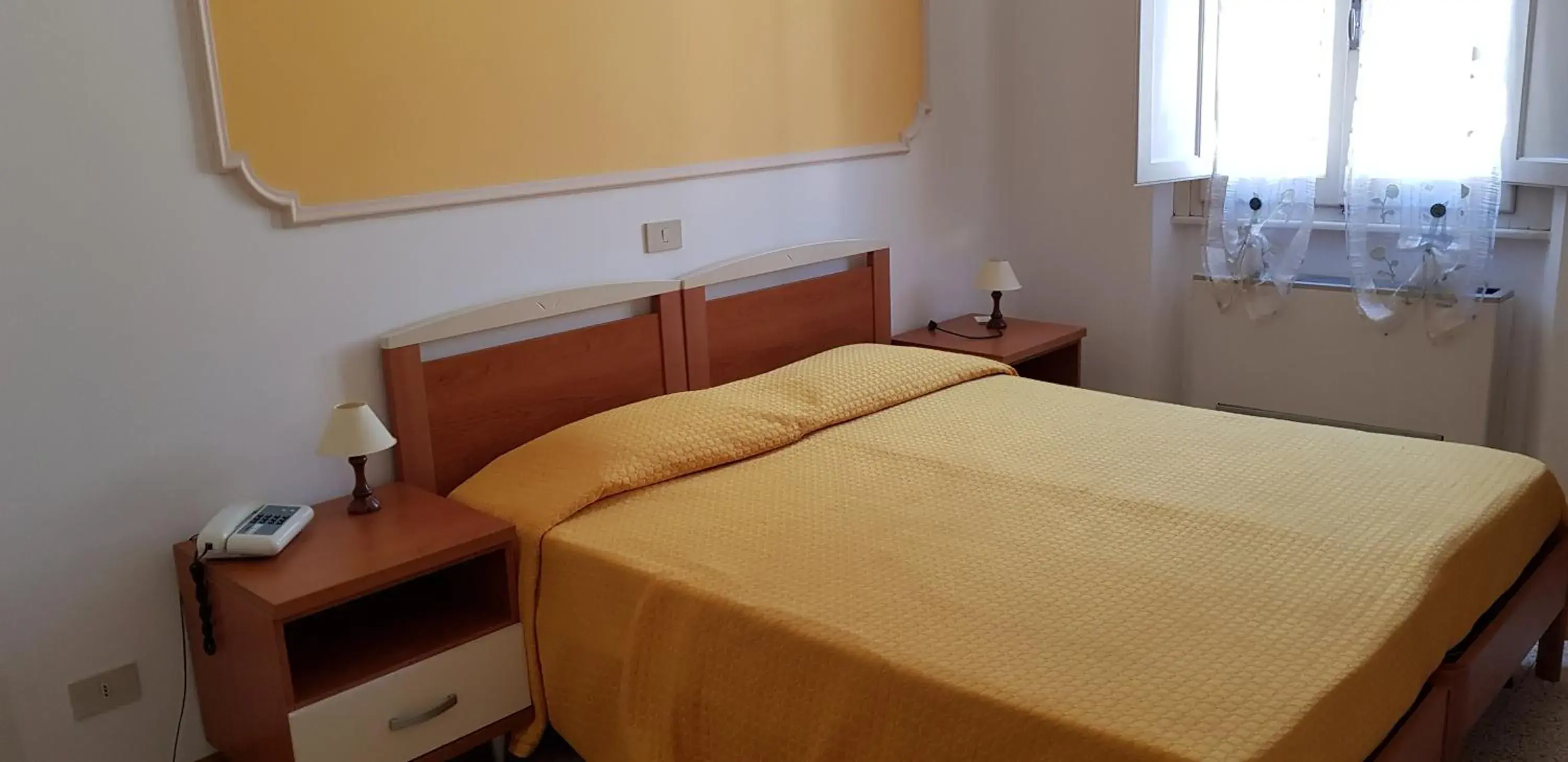 Bed in Albergo Natucci