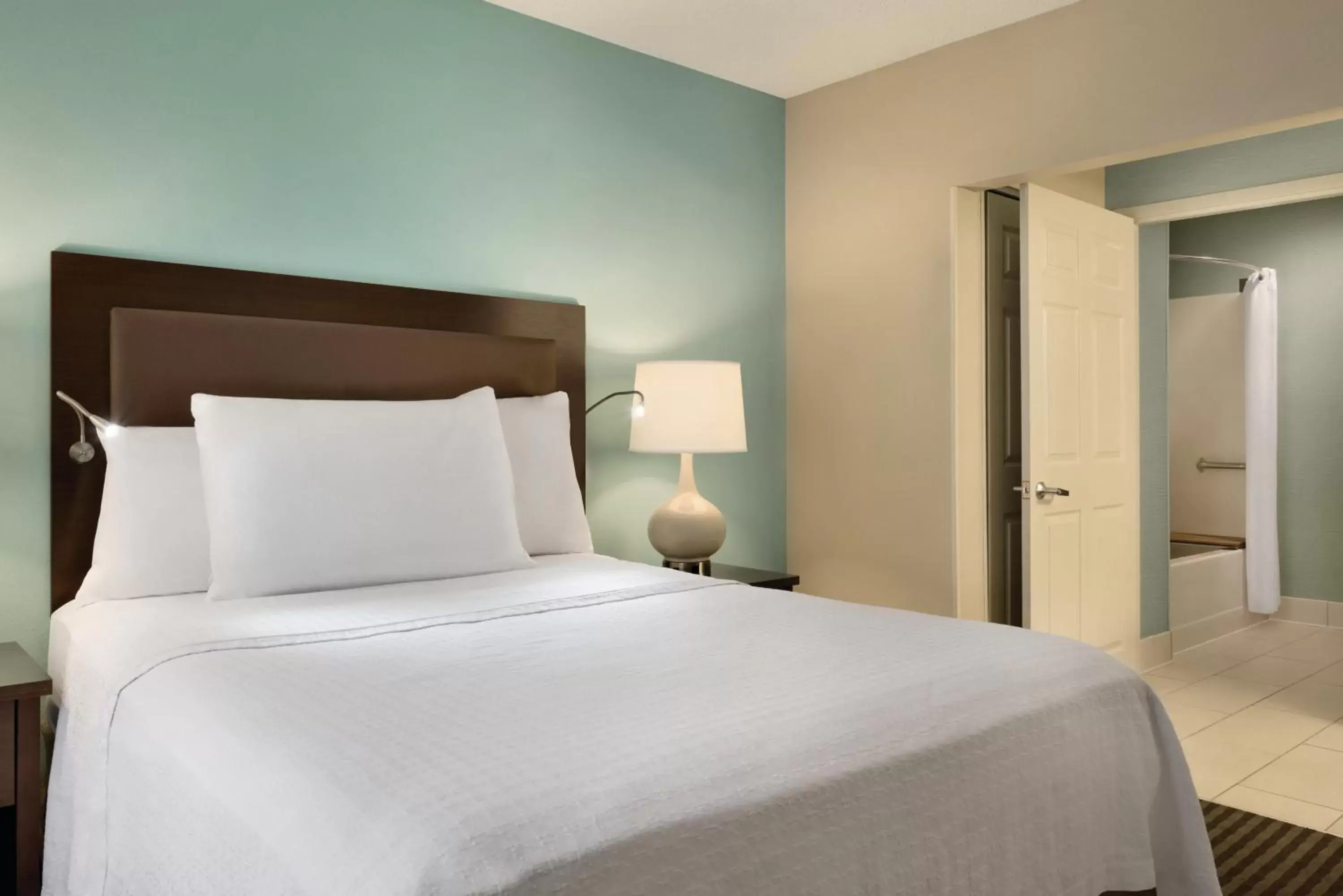 Bed in Homewood Suites Grand Rapids