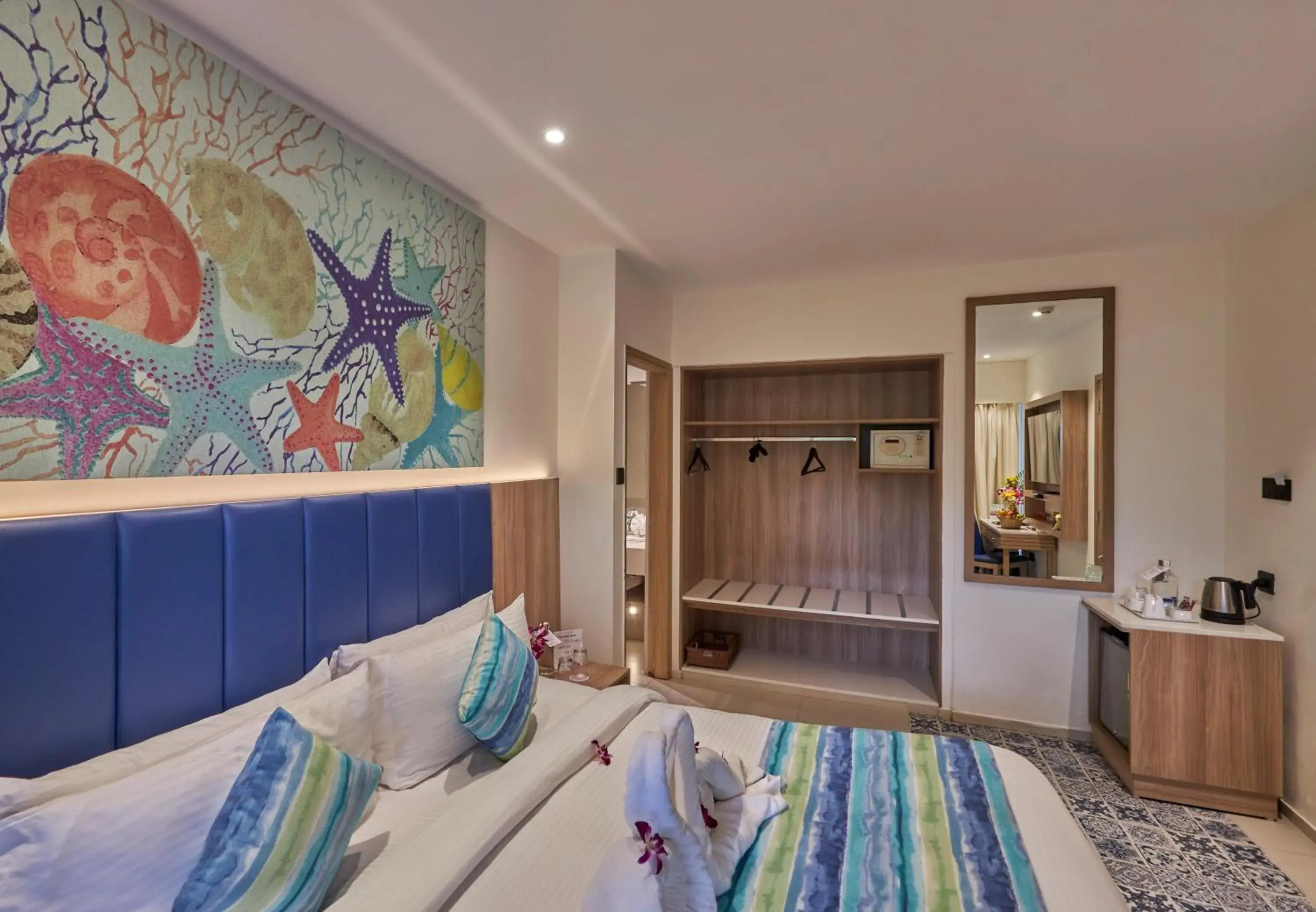 Bedroom, Bed in Royal Orchid Beach Resort & Spa, Utorda Beach Goa