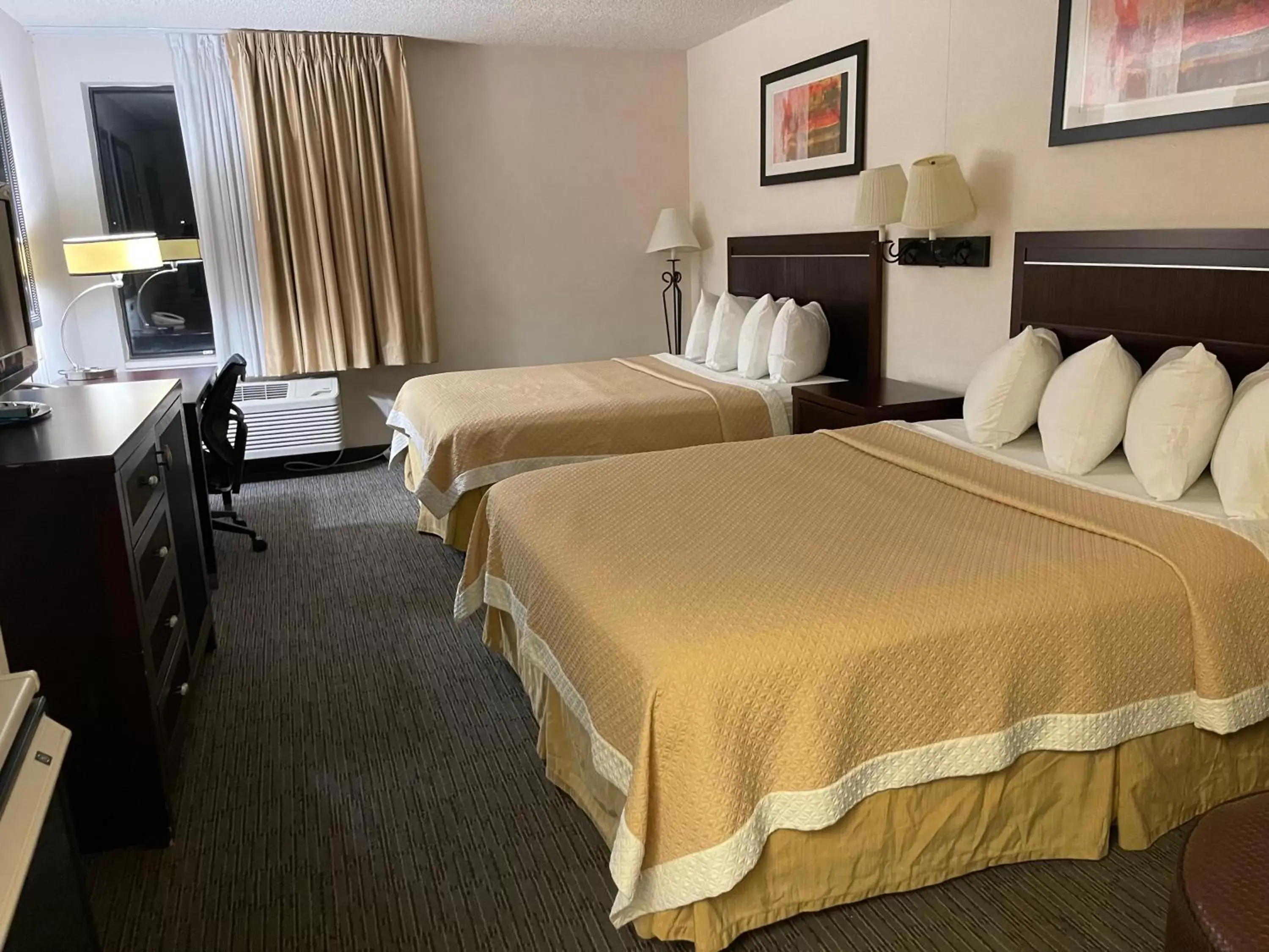 Bed in Days Inn & Suites by Wyndham Denver International Airport