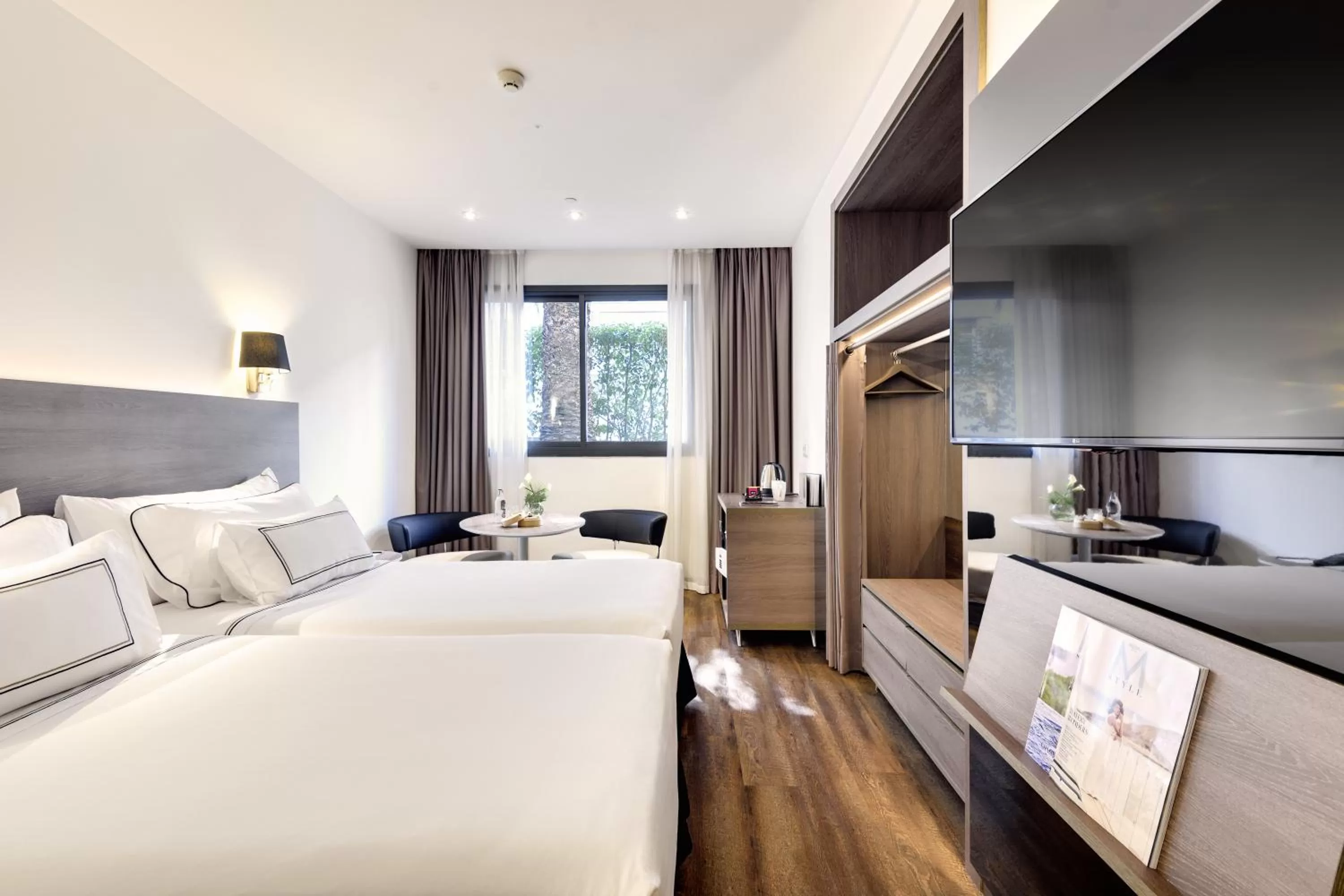 Photo of the whole room, Bed in Melia Madrid Serrano